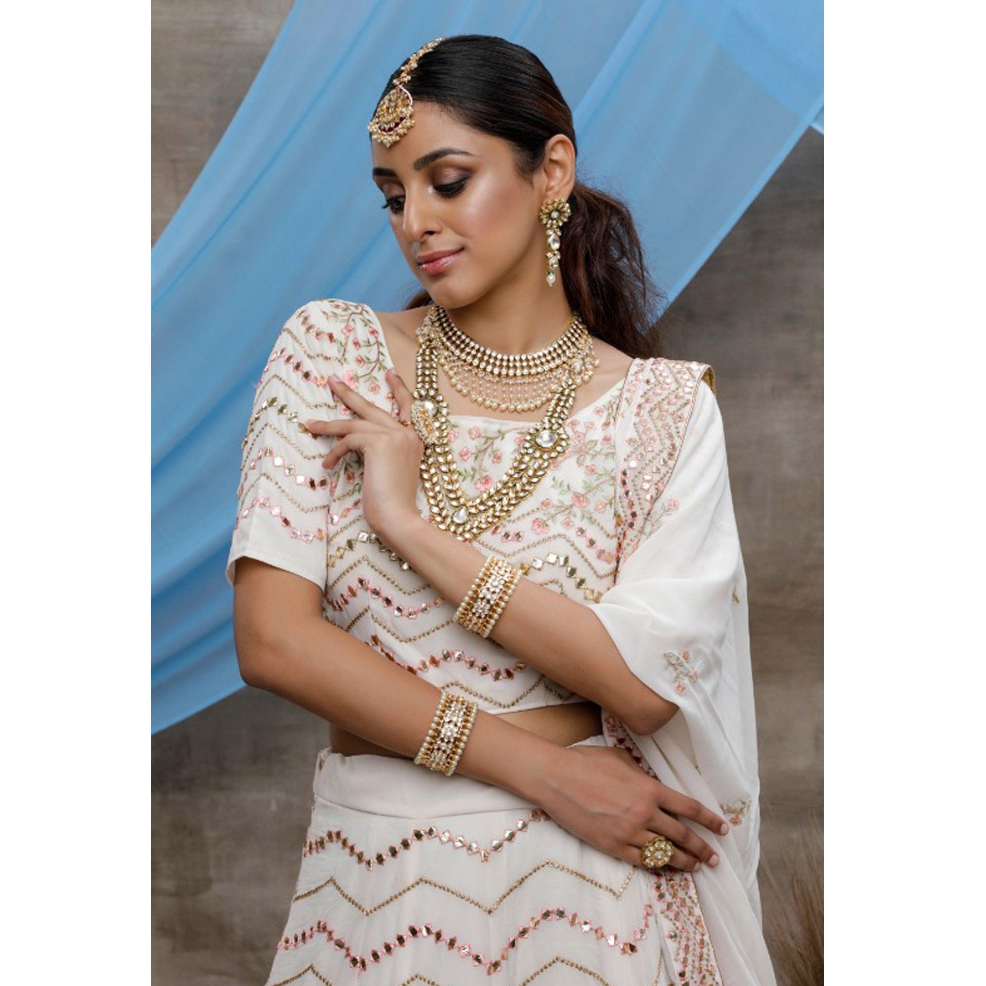 Elegant White Colored Party Wear Embroidered Georgette Lehenga Choli - Peachmode