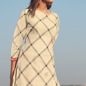Engrossing Beige Colored Party Wear Handwork Handloom Cotton Kurti-Pant Set - Peachmode