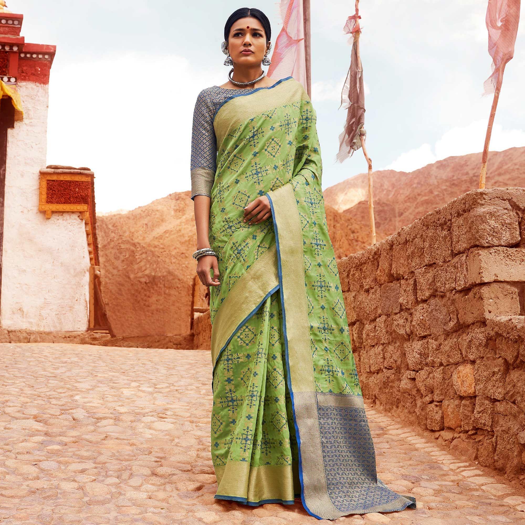 Engrossing Green Colored Festive Wear Woven Silk Saree - Peachmode
