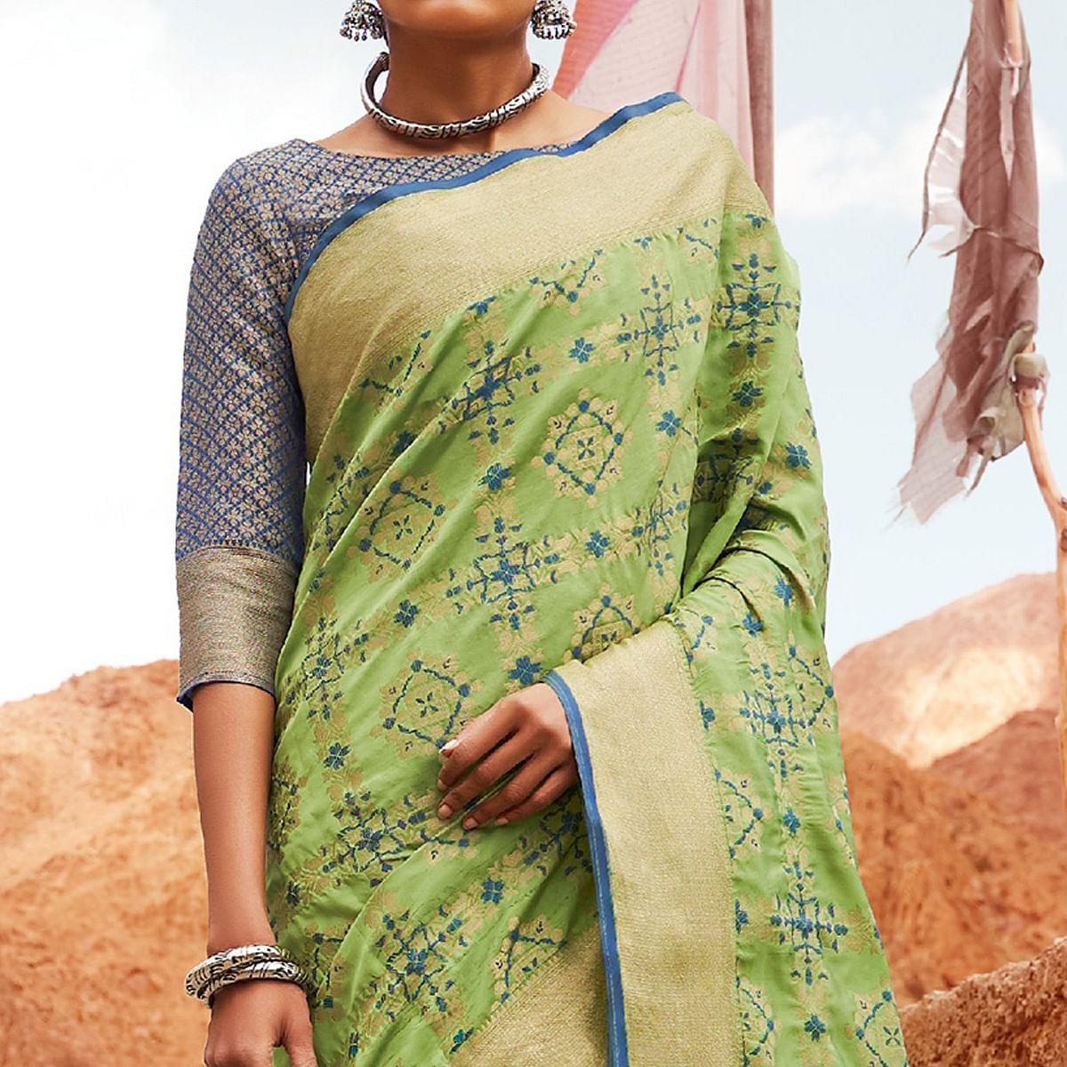 Engrossing Green Colored Festive Wear Woven Silk Saree - Peachmode