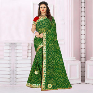 Engrossing Green Coloured Casual Wear Printed Georgette Saree - Peachmode