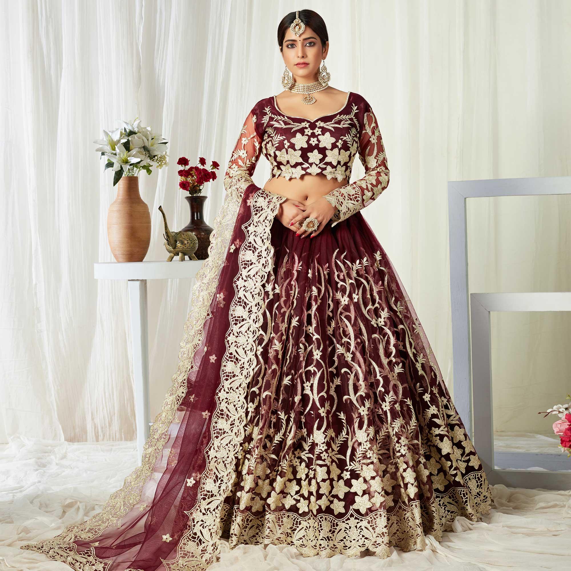 Entrancing Maroon Colored Wedding Wear Butterfly Net With Embroidered Lehenga Choli - Peachmode