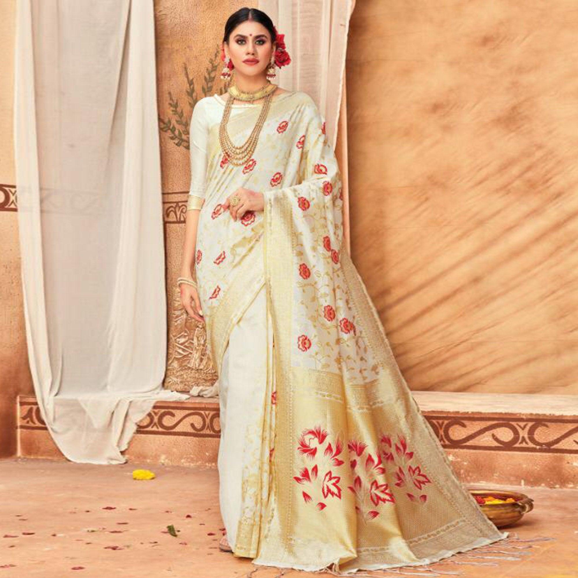 Exceptional Cream Colored Festive Wear Woven Silk Blend Saree With Tassels - Peachmode