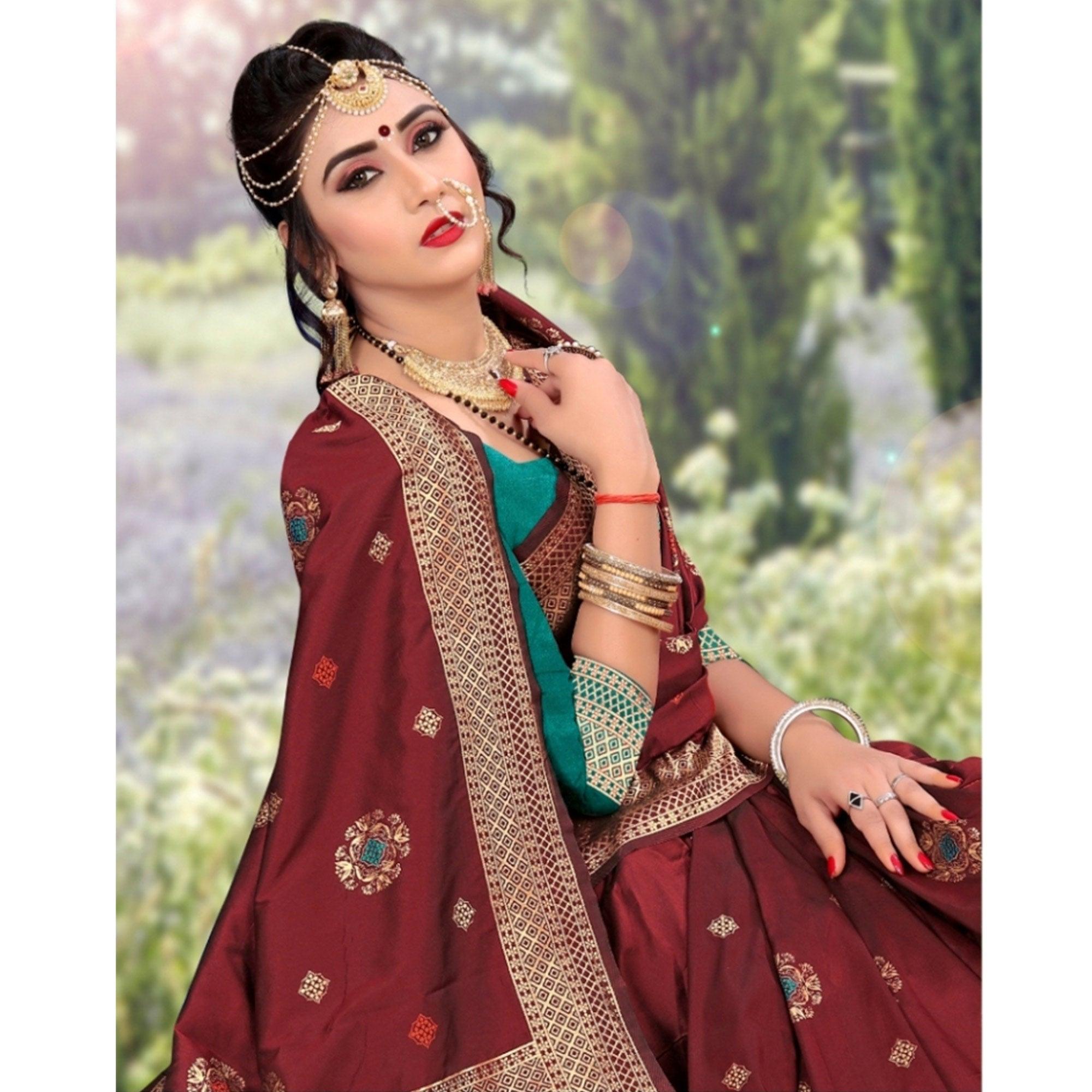 Exotic Maroon Colored Festive Wear Woven Lichi Silk Saree - Peachmode