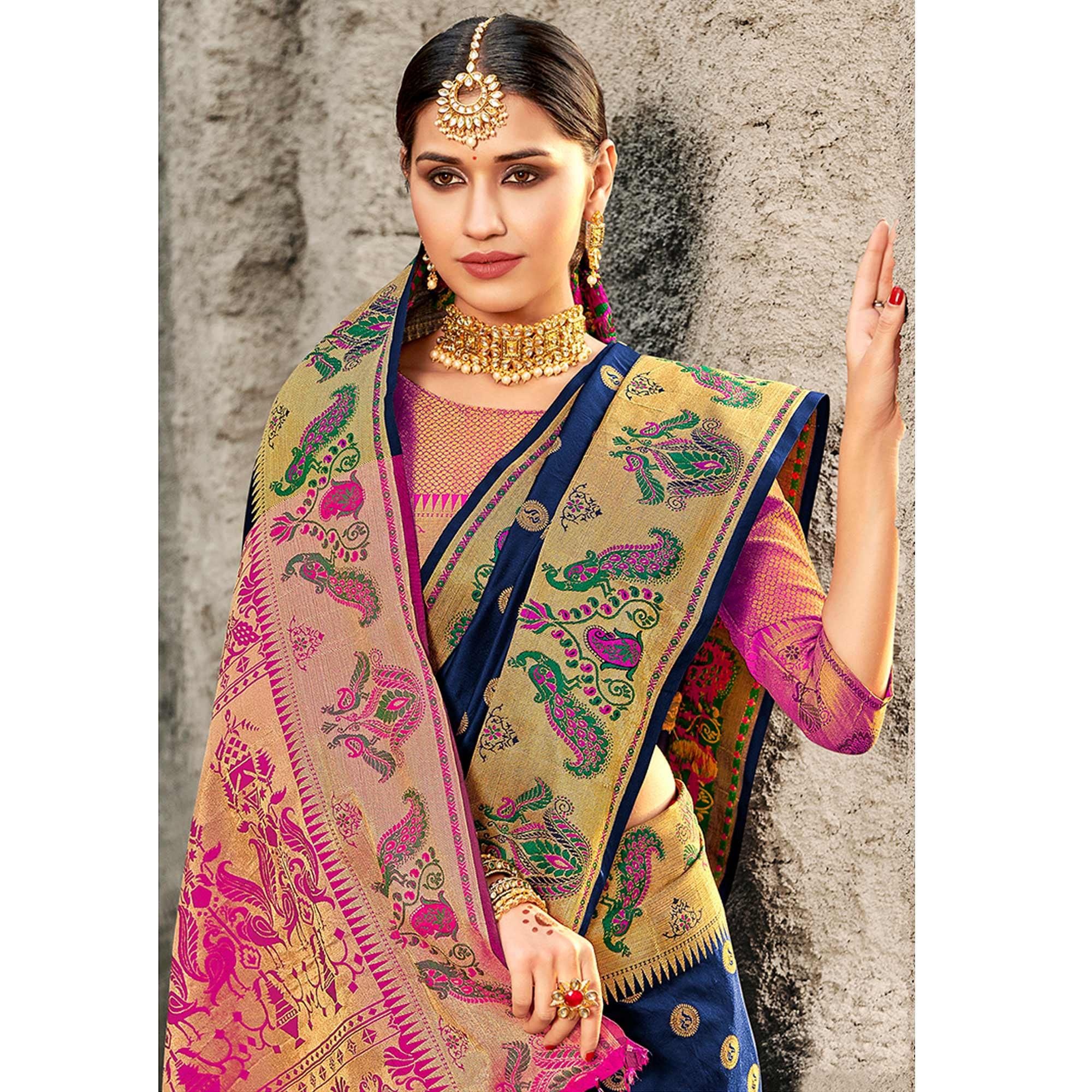 Exotic Navy Blue Colored Festive Wear Woven Banarasi Silk Saree With Tassels - Peachmode