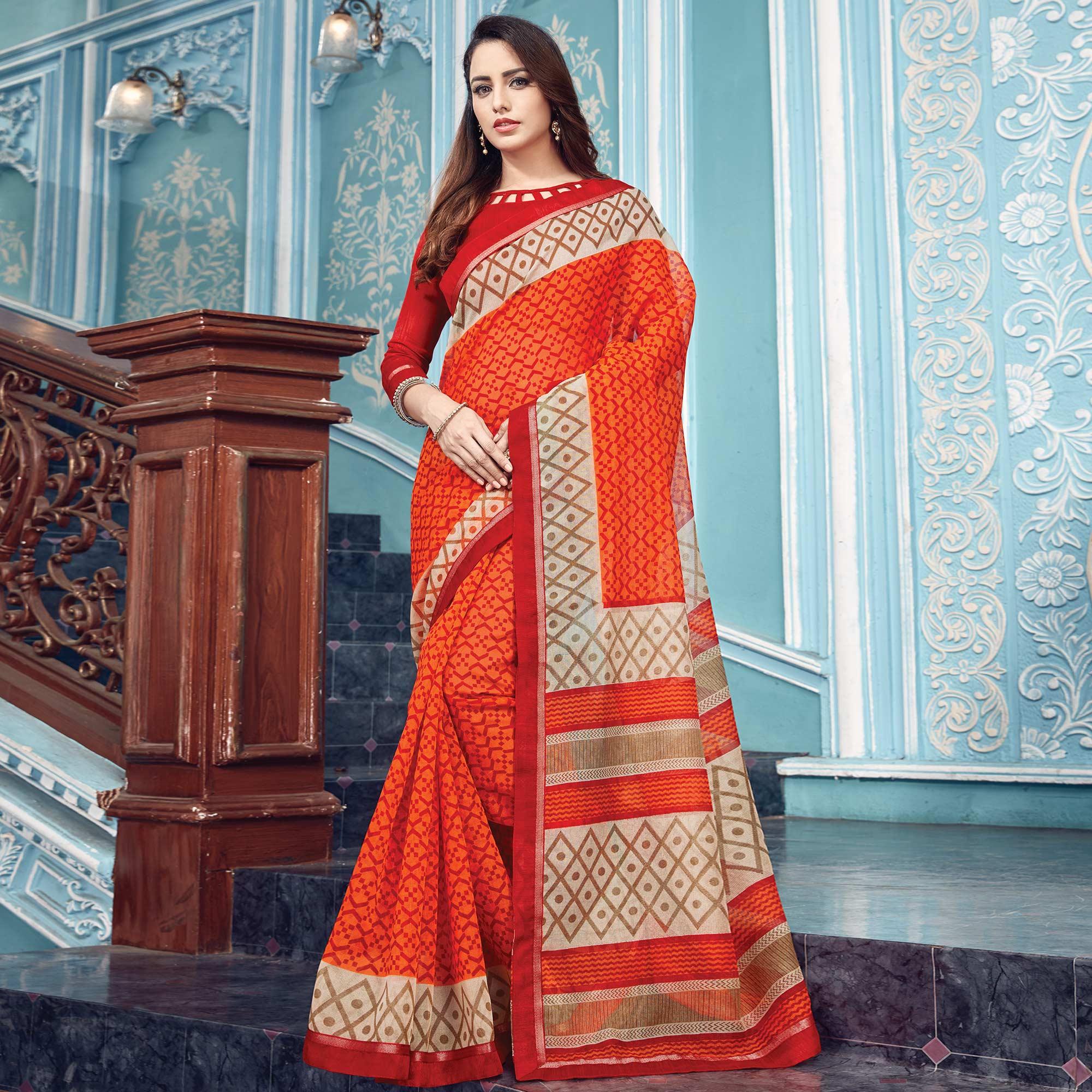 Eye-catching Orange Colored Partywear Printed Silk Saree - Peachmode