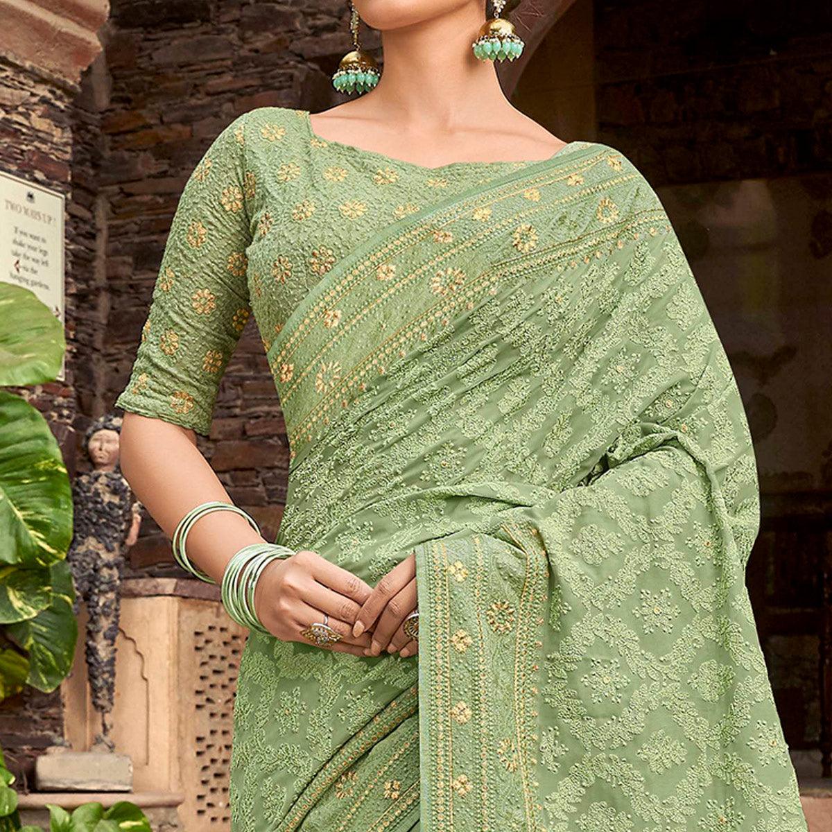 Eye-catching Pista Green Colored Partywear Embroidered Satin - Gerogette Saree - Peachmode