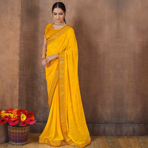 Fantastic Yellow Colored Festive Wear Foil Printed Georgette Saree - Peachmode