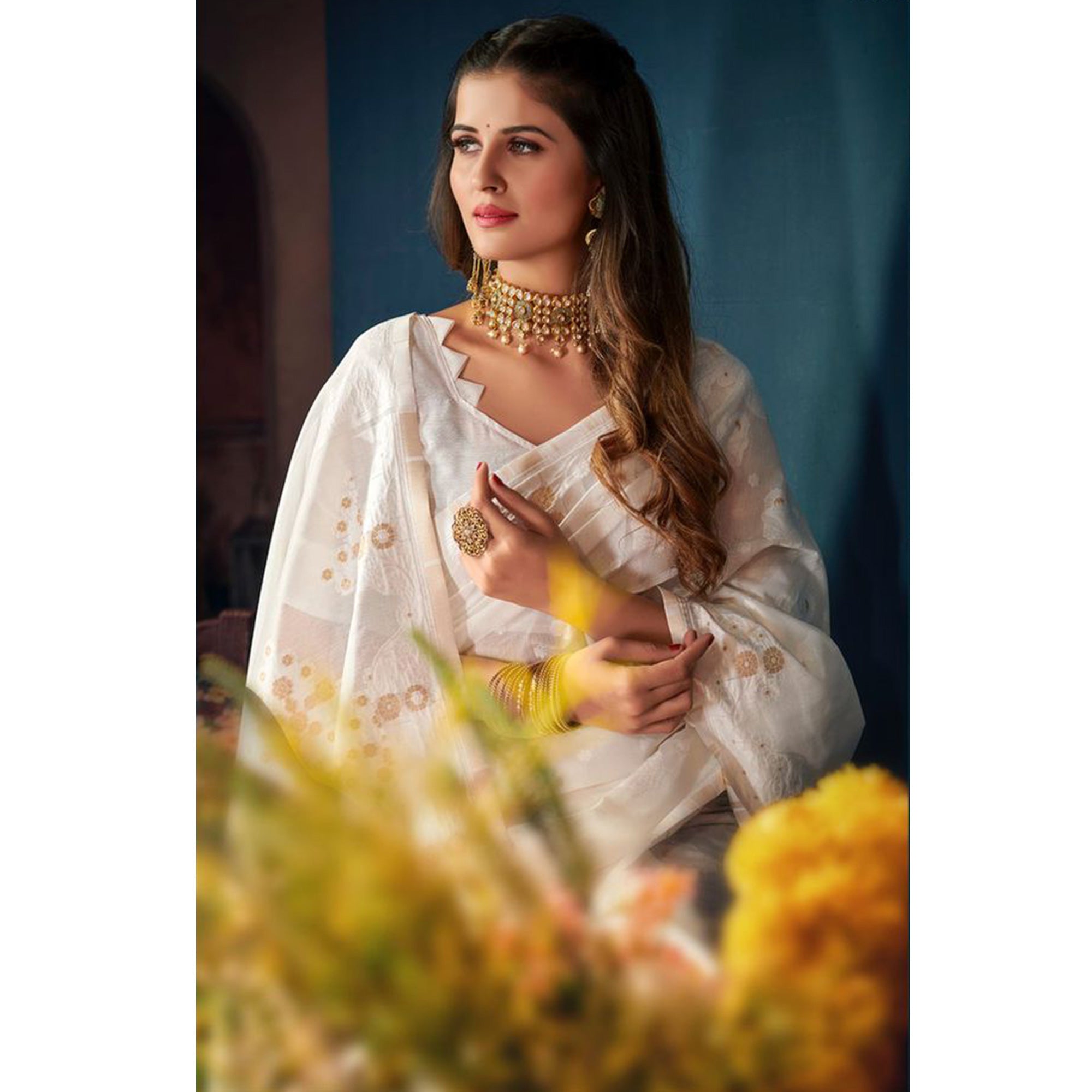 White Woven Cotton Blend Saree With Tassels