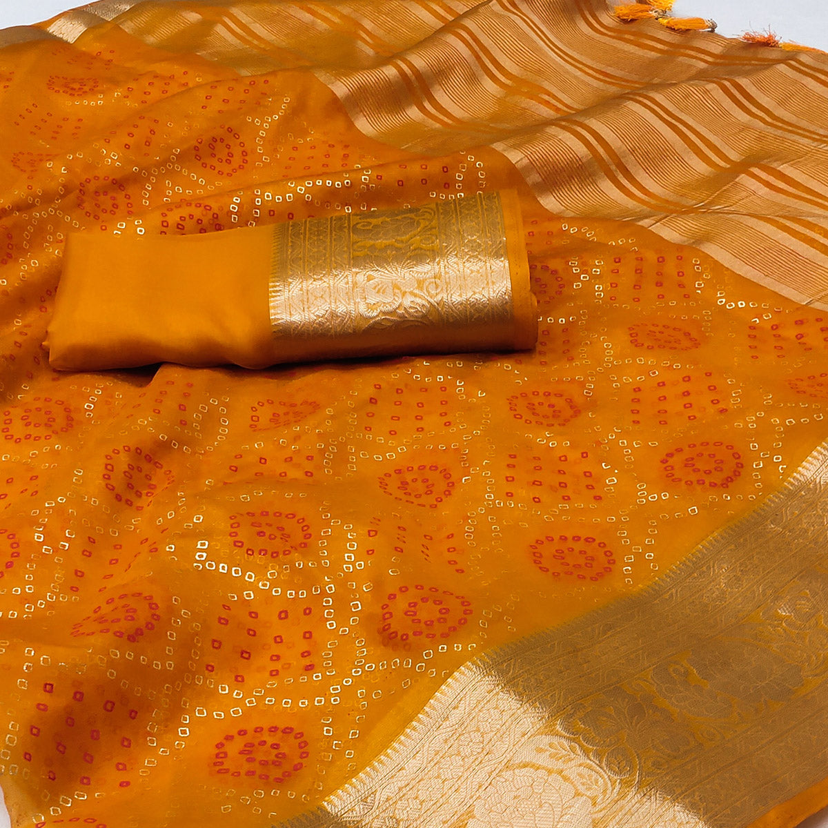 Mustard Bandhani Printed Organza Saree With Tassels