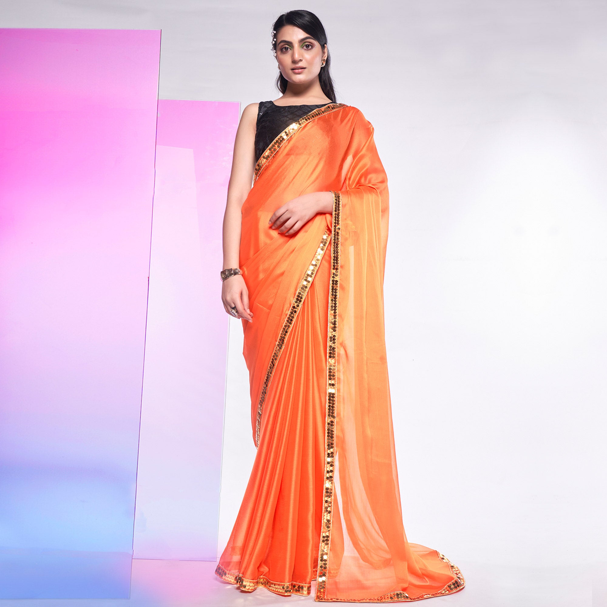 Orange Solid With Embroidered Border Georgette Saree