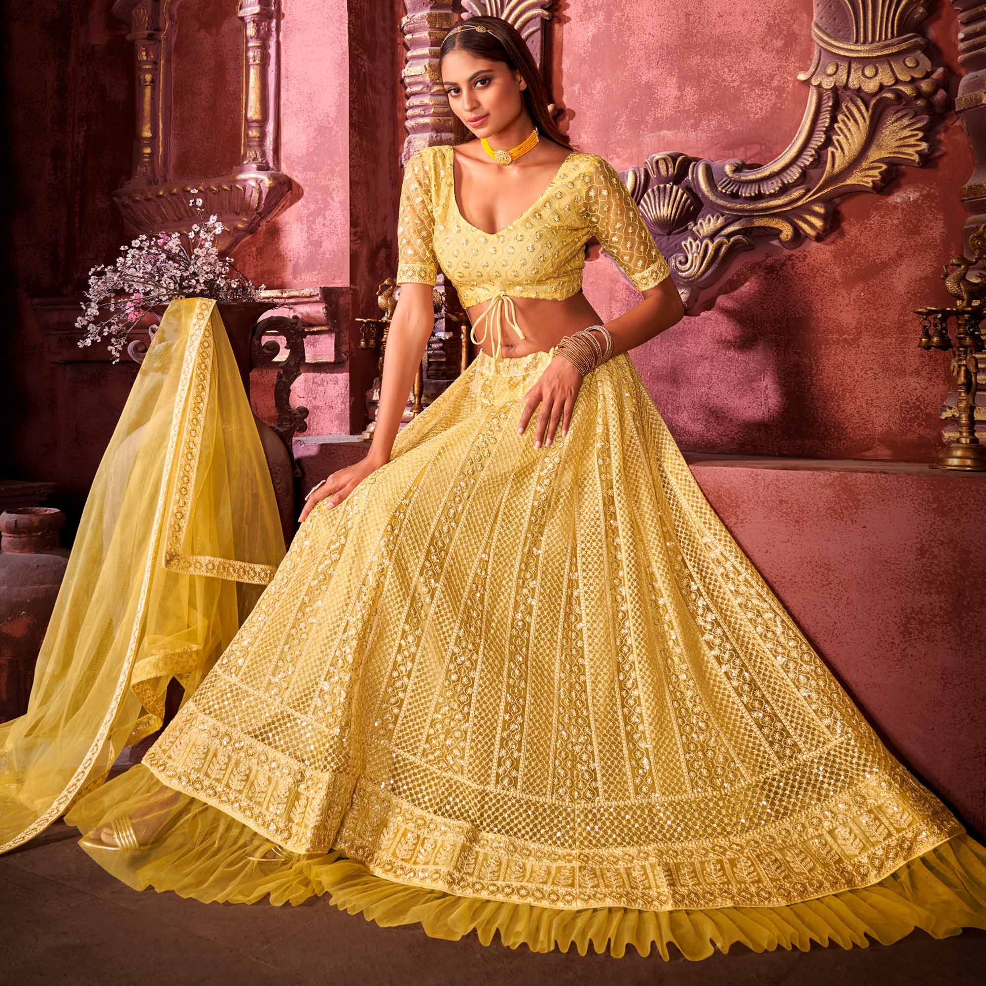 Yellow Floral Sequins Embroidered Net Lehenga Choli