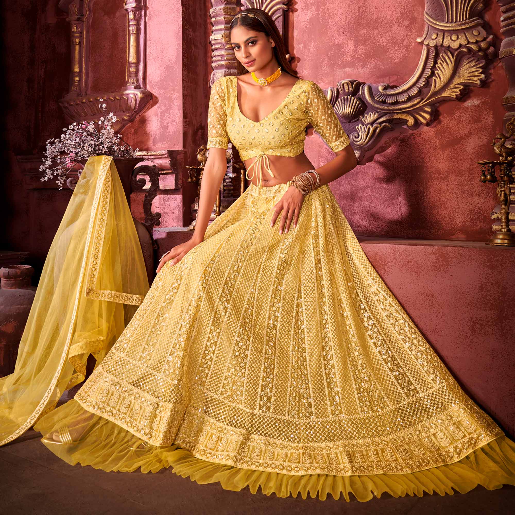 Yellow Floral Sequins Embroidered Net Lehenga Choli