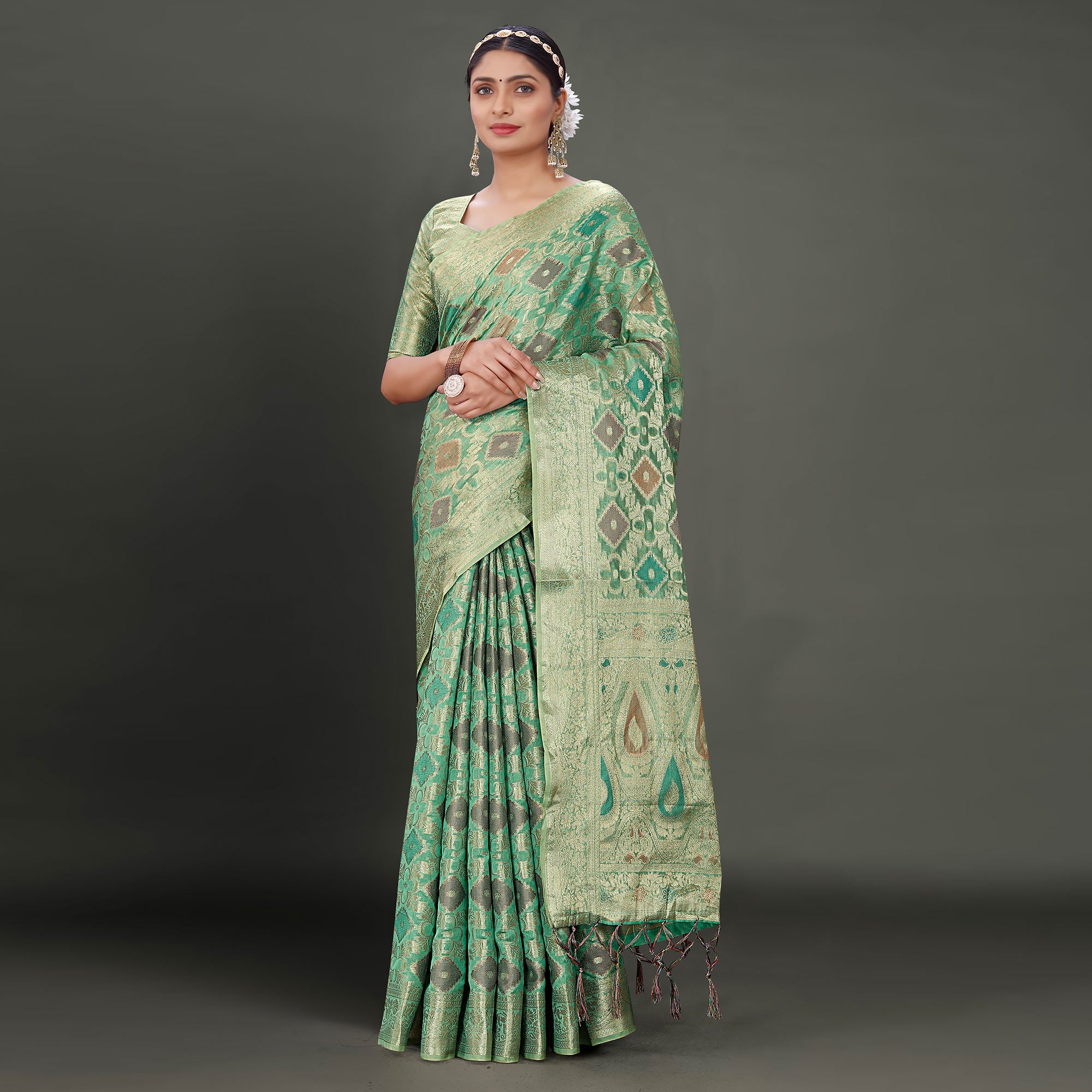 Rama Green Woven Organza Saree With Tassels