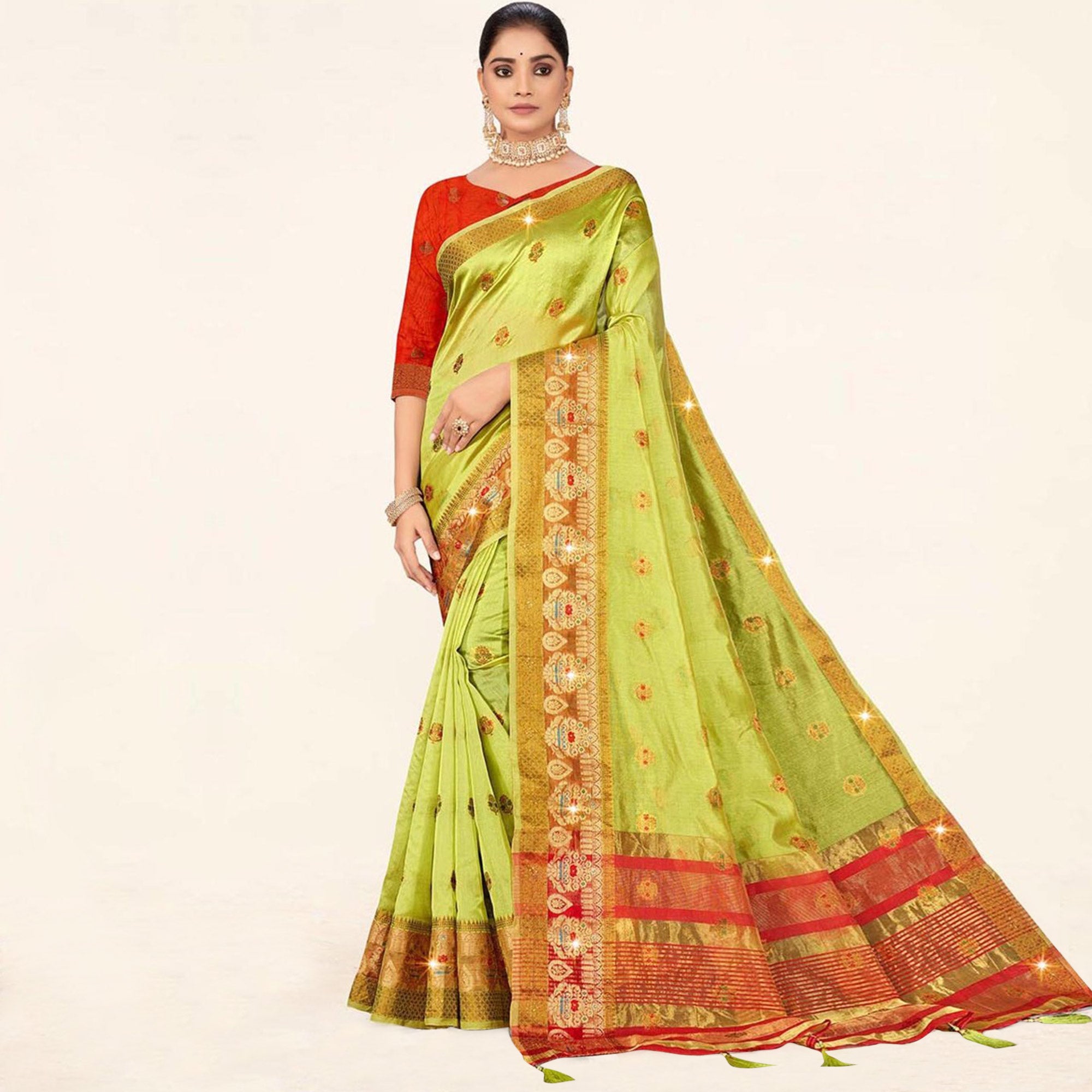 Pista Green Woven Organza Saree With Tassels