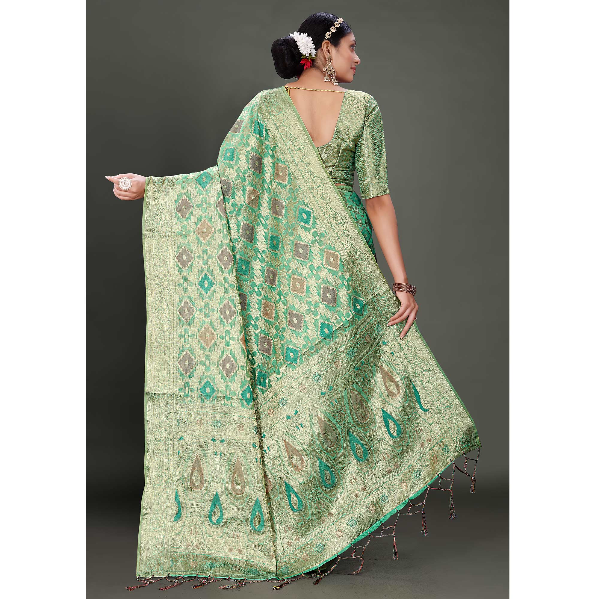 Rama Green Woven Organza Saree With Tassels