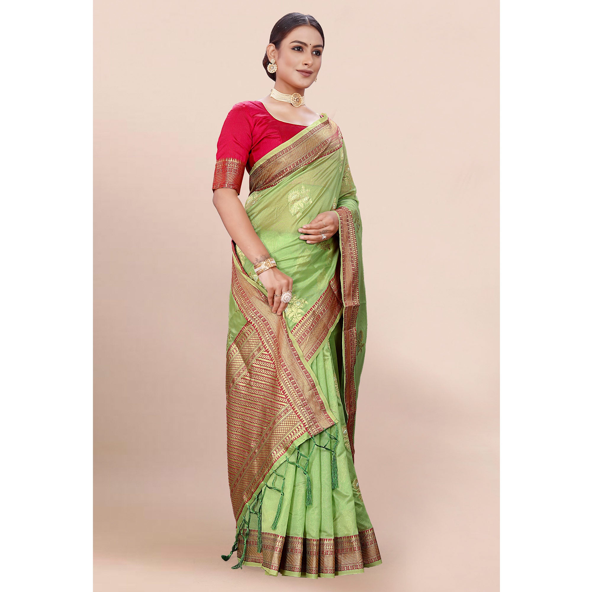 Green Woven Organza Saree With Tassels