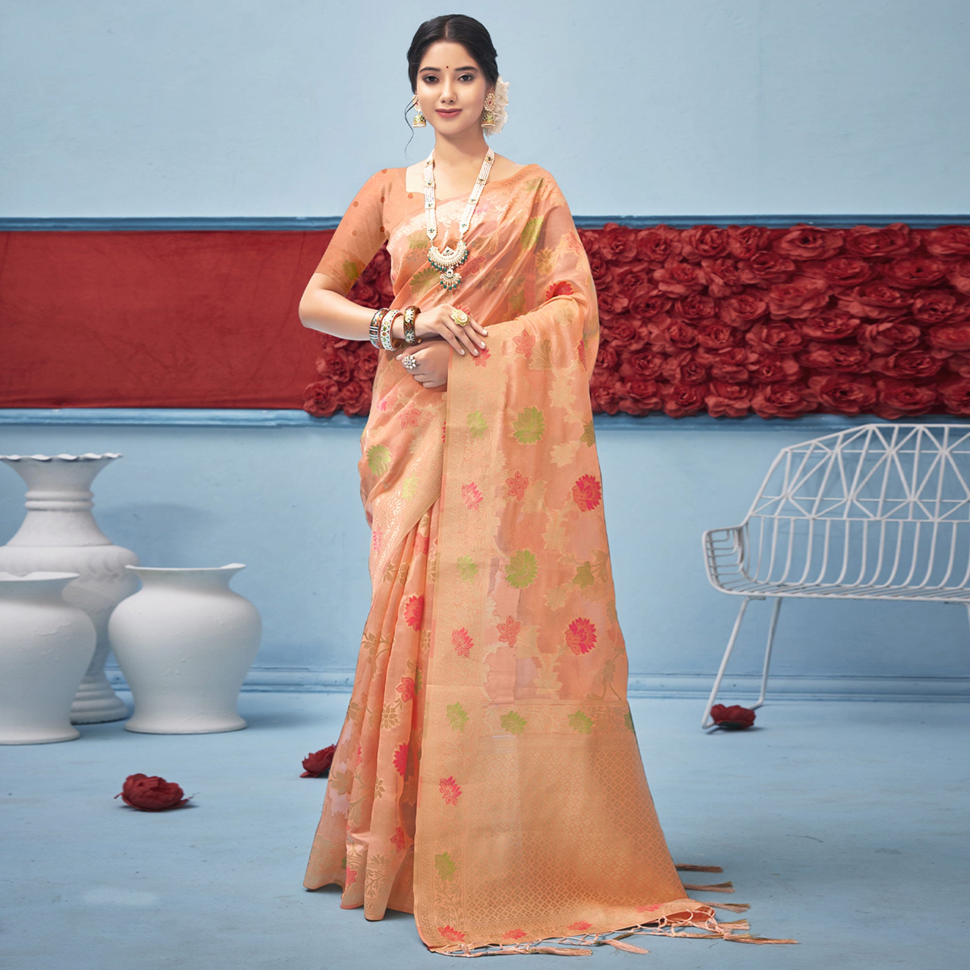 Peach Woven Organza Saree With Tassels