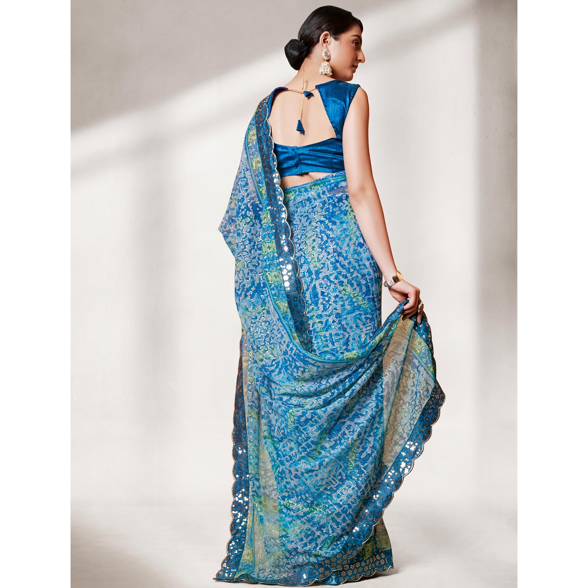 Blue Printed With Sequins Border Georgette Saree