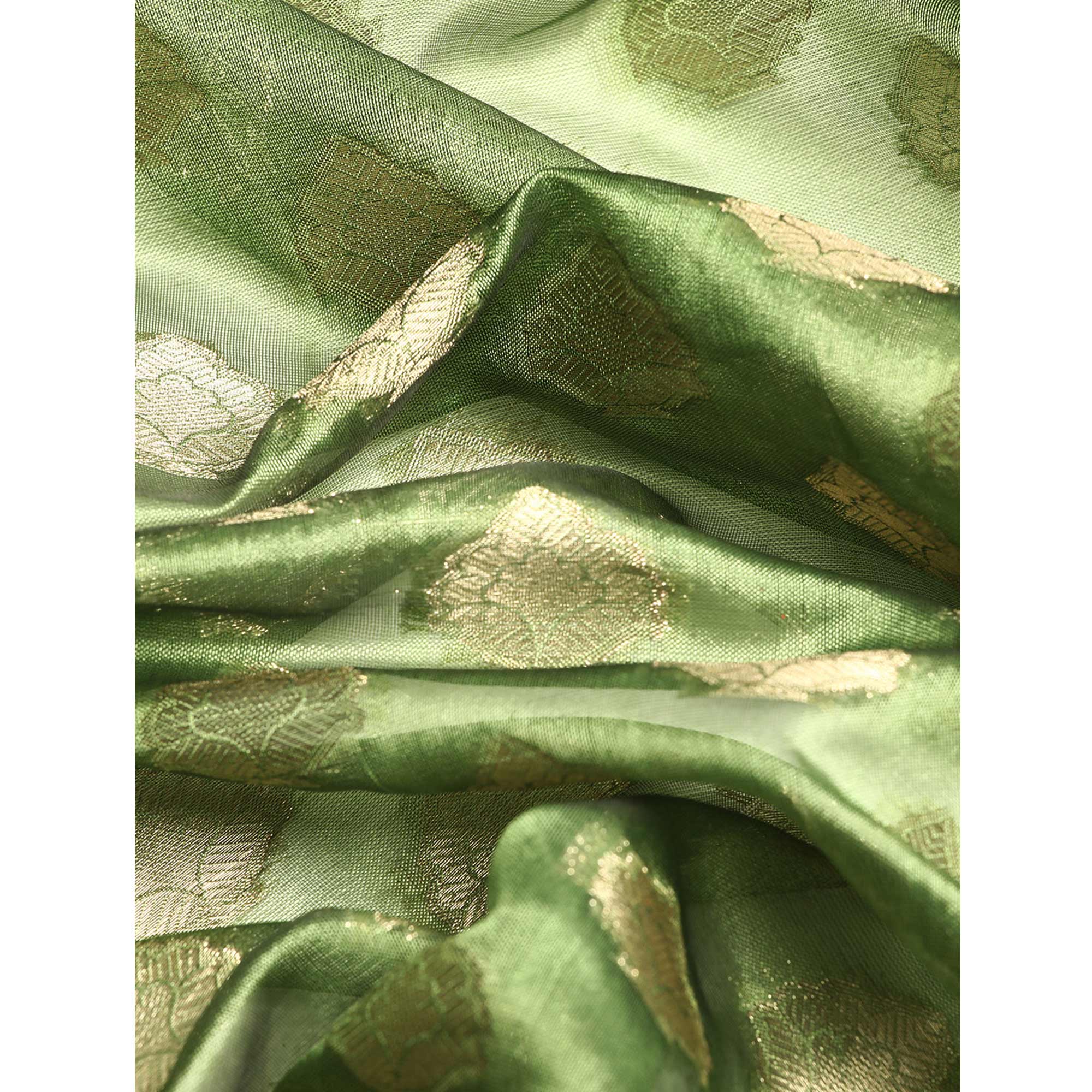 Green Woven Organza Silk Saree With Tassels