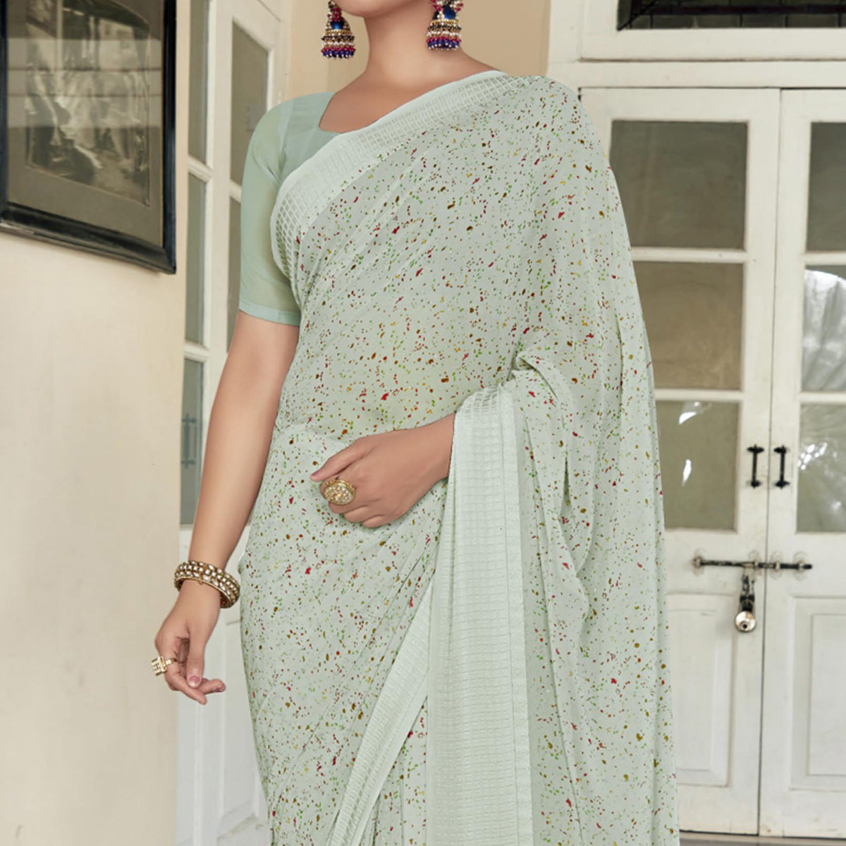 Green Printed Georgette Saree With Checks Border