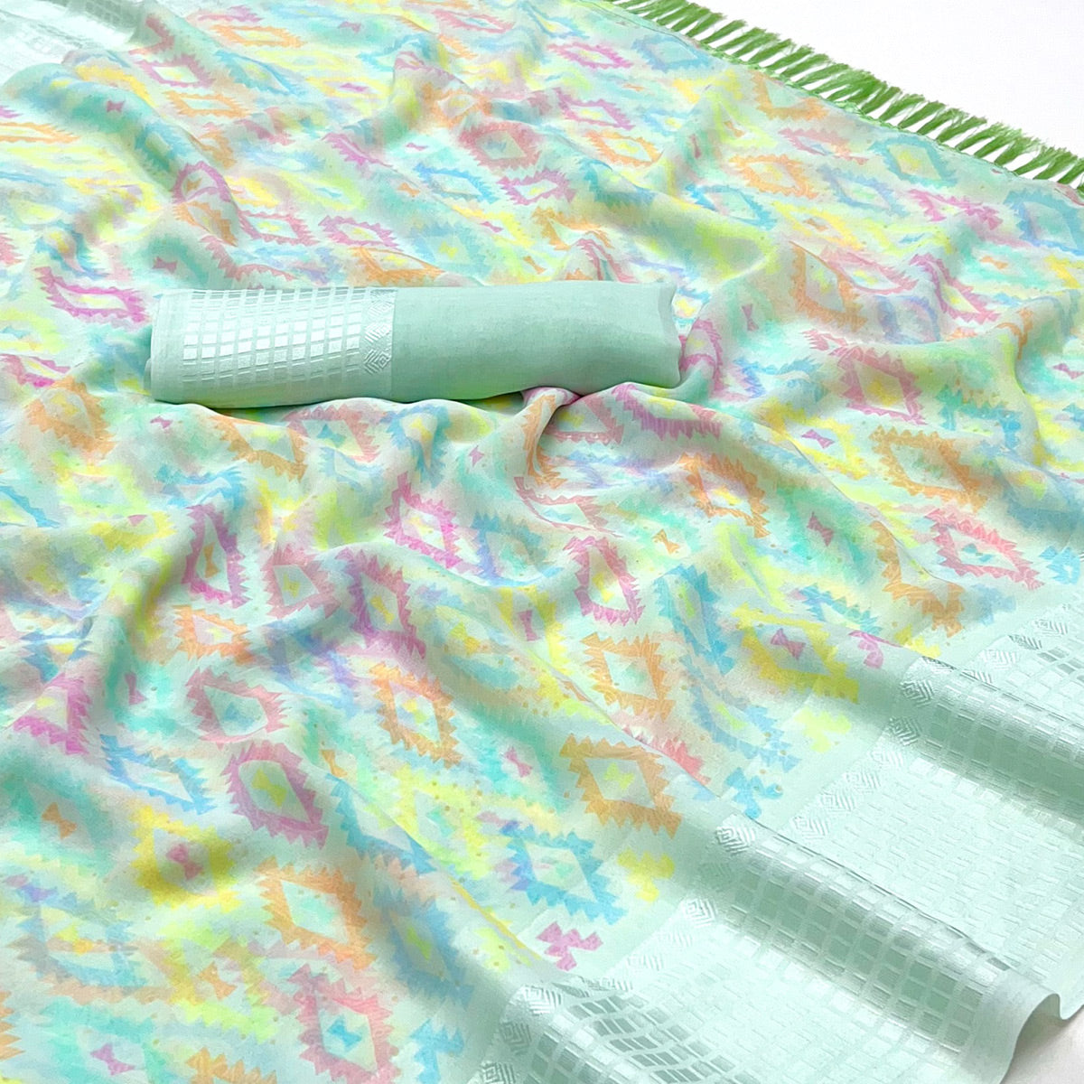 Sea Green Printed Georgette Saree With Tassels