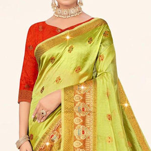 Pista Green Woven Organza Saree With Tassels