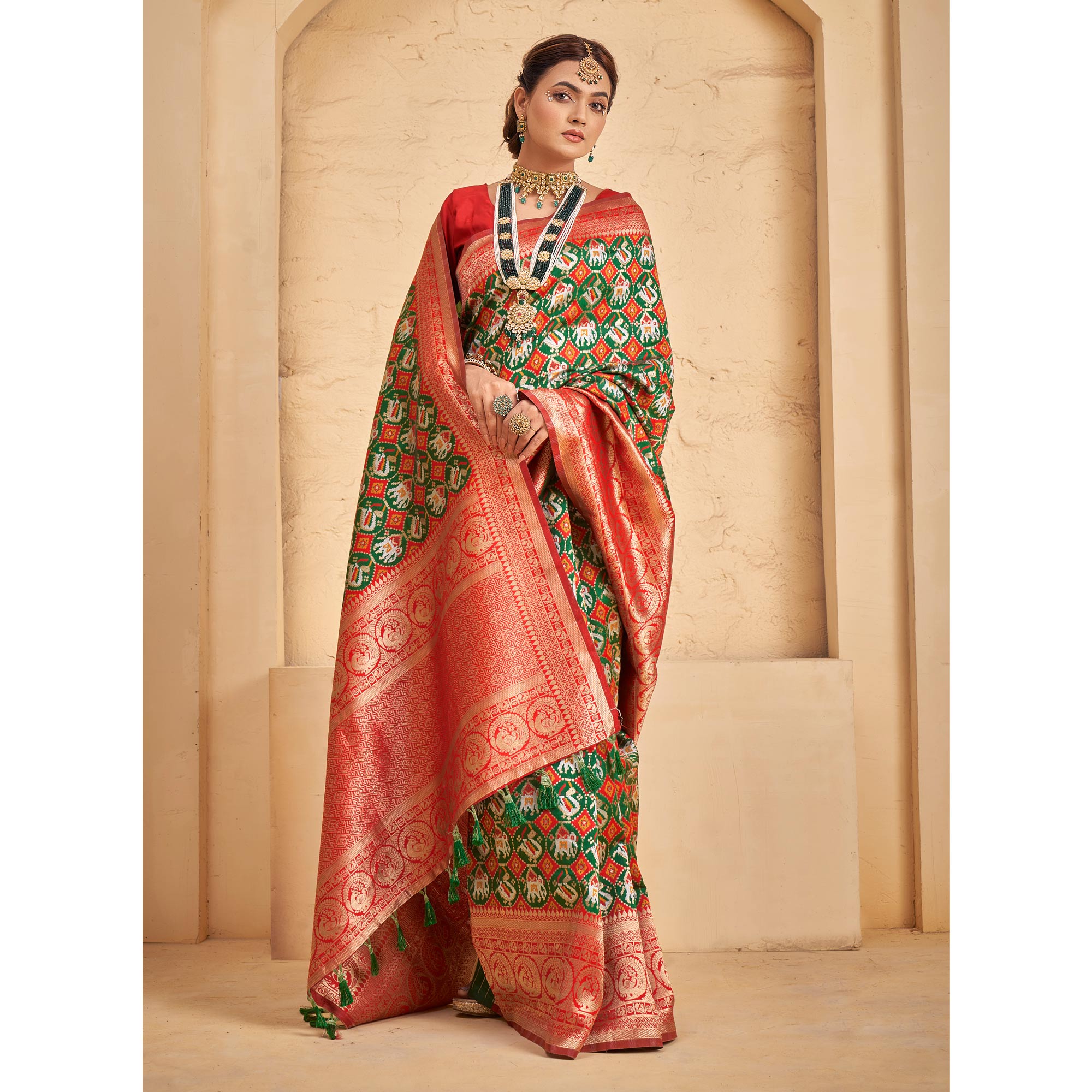 Green Woven Patola Art Silk Saree With Tassels
