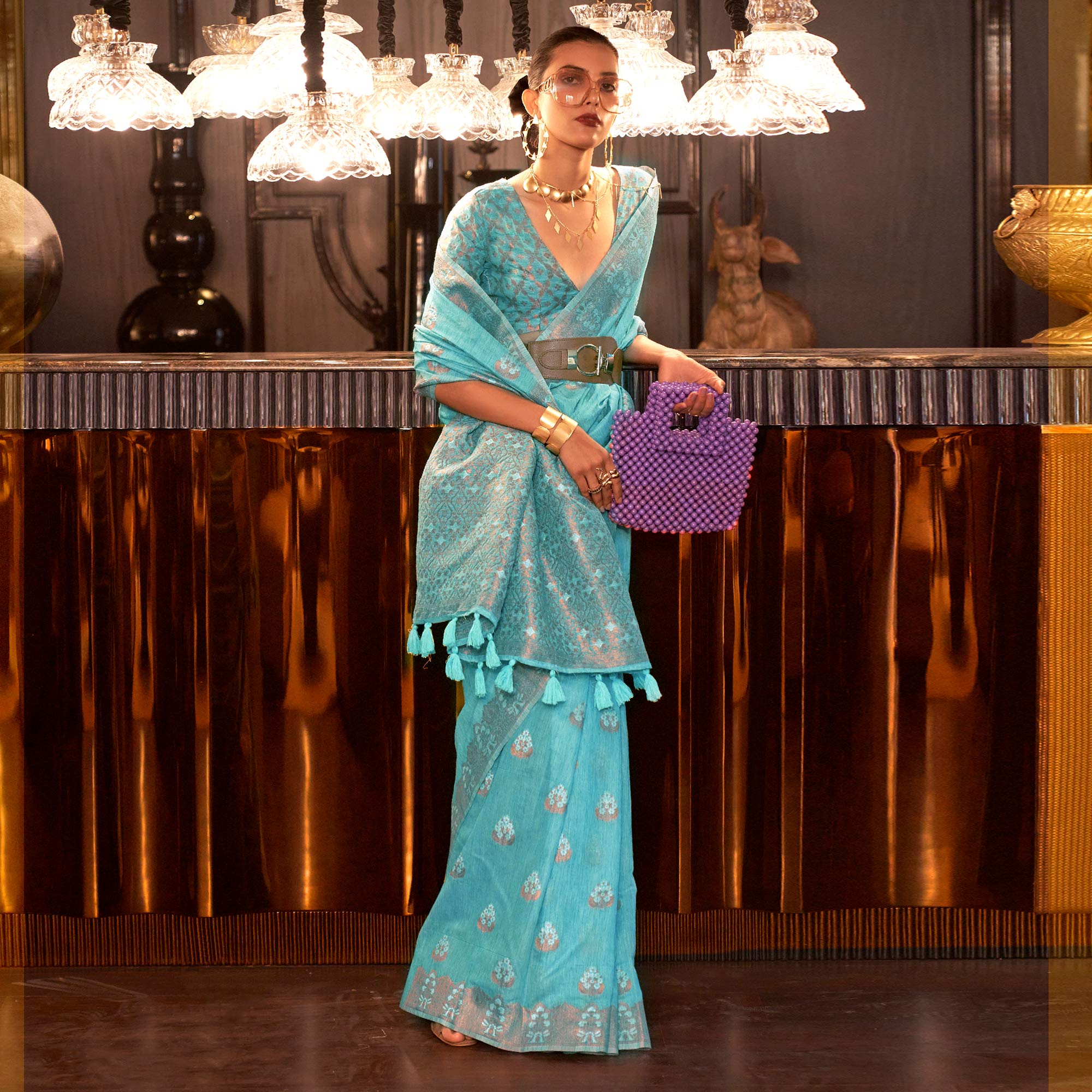Sky Blue Woven Linen Saree With Tassels