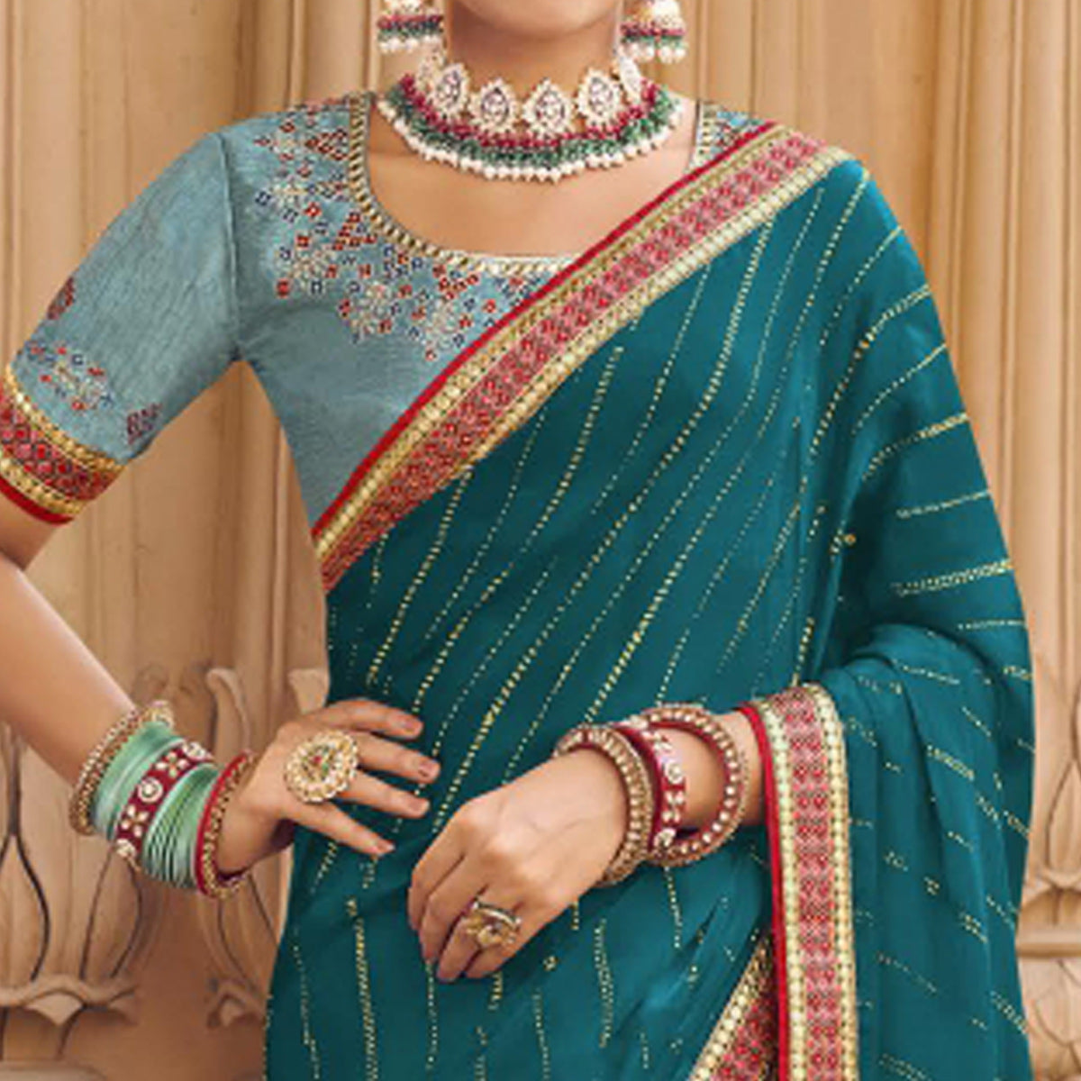 Teal Blue Embellished With Embroidered Border Satin Saree
