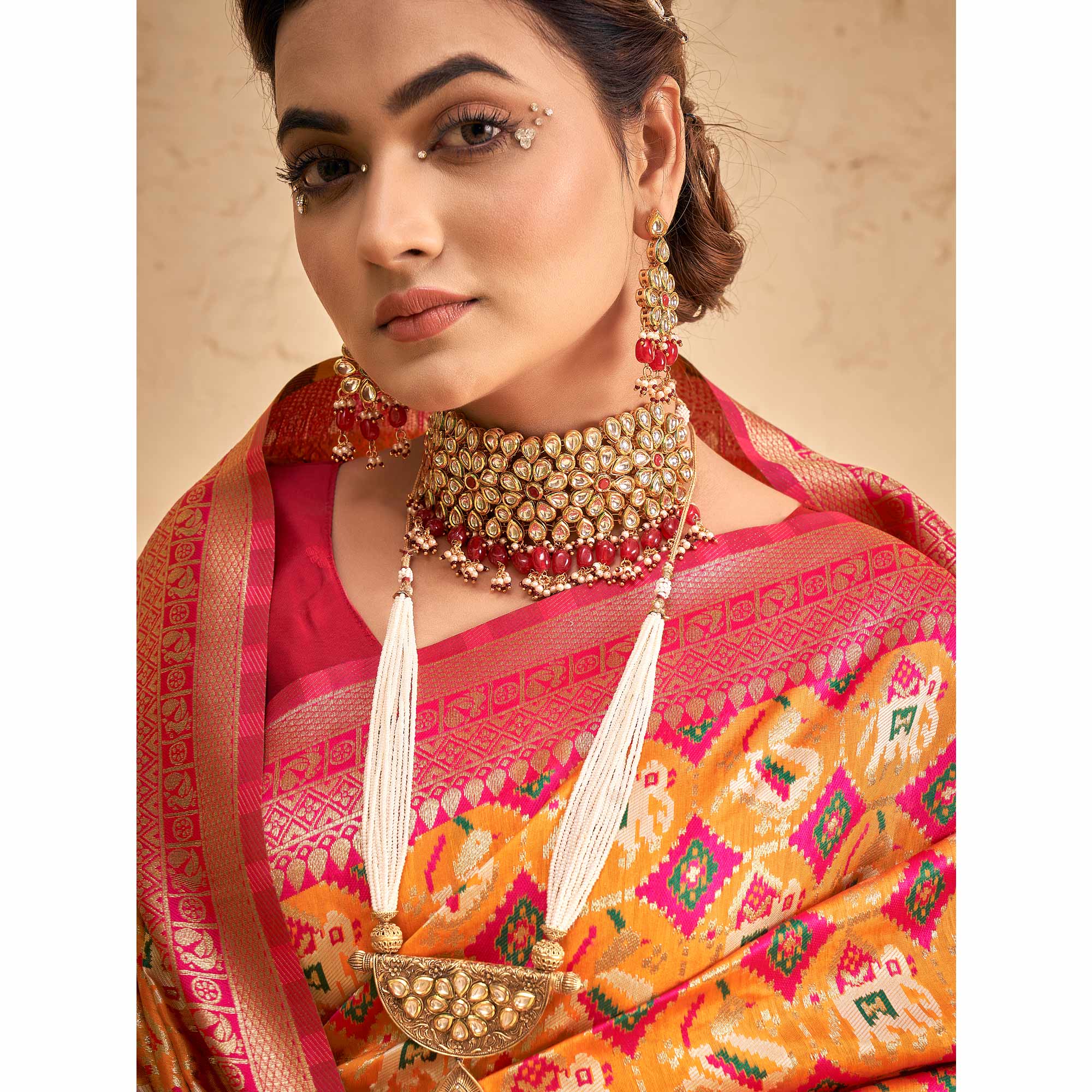 Orange Woven Patola Art Silk Saree With Tassels