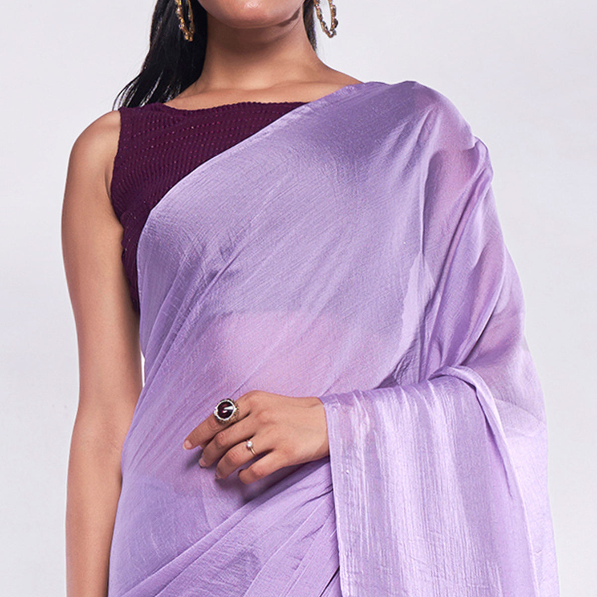 Purple Solid Georgette Saree With Tassels