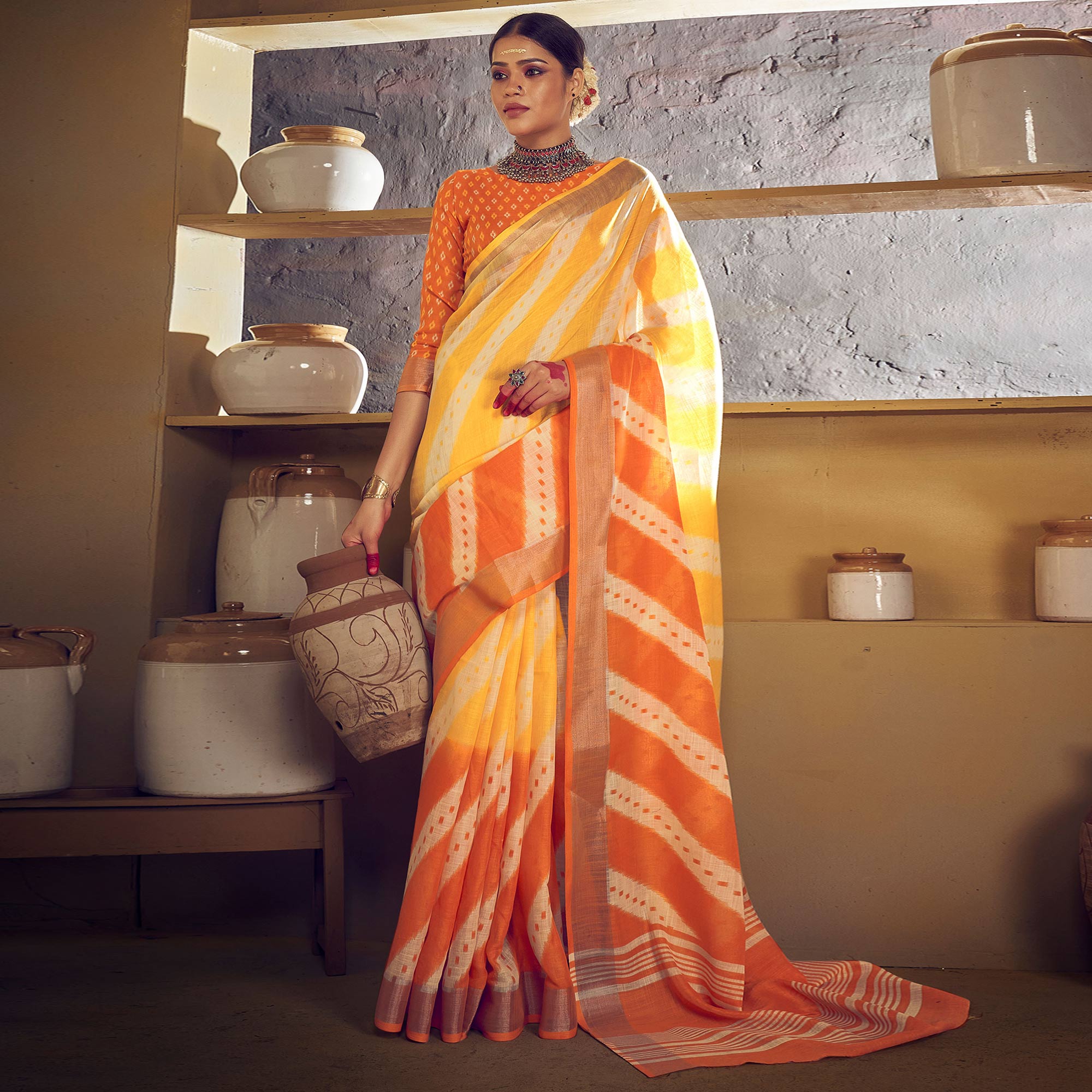 Yellow & Orange Printed With Zari Border Linen Saree