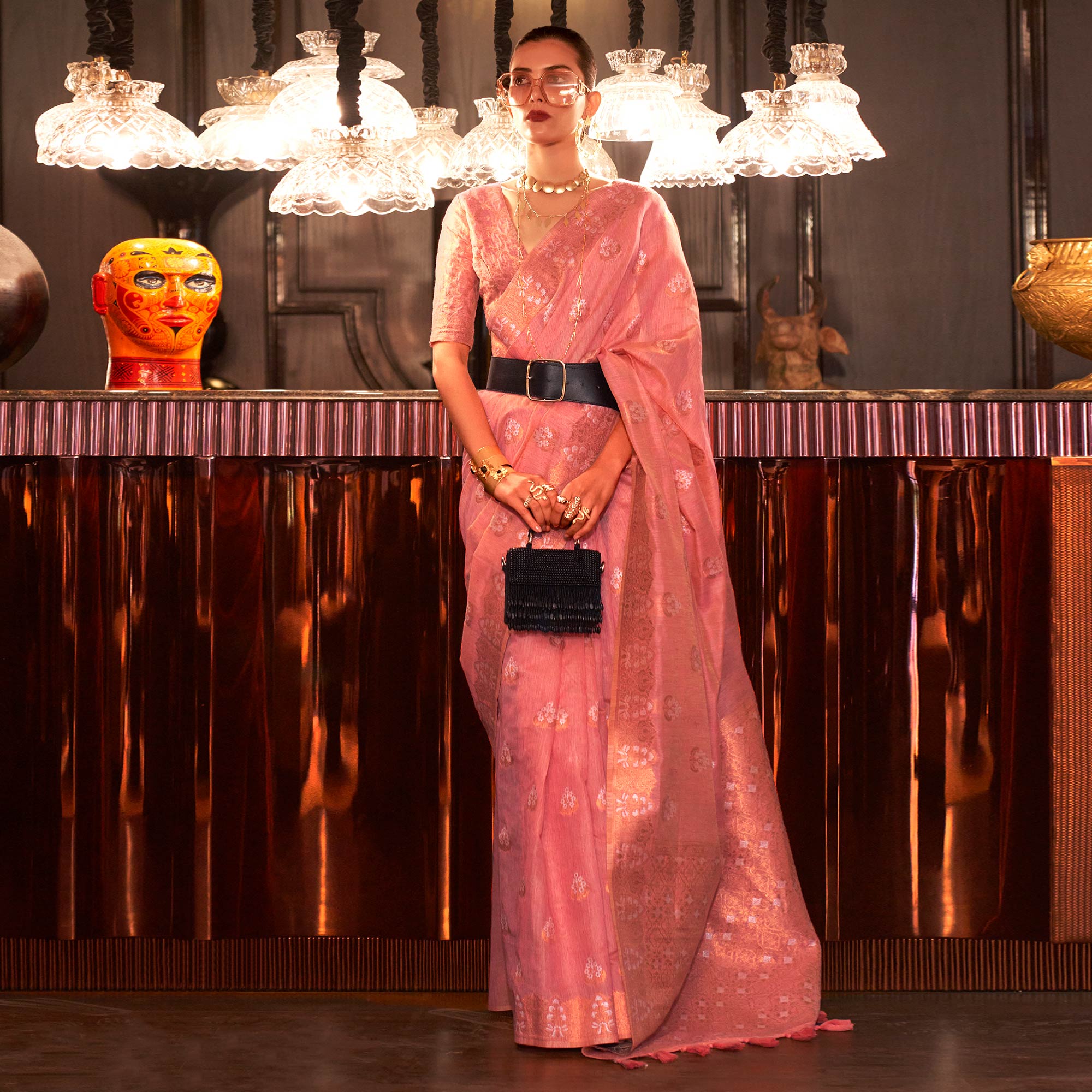 Salmon Pink Woven Linen Saree With Tassels