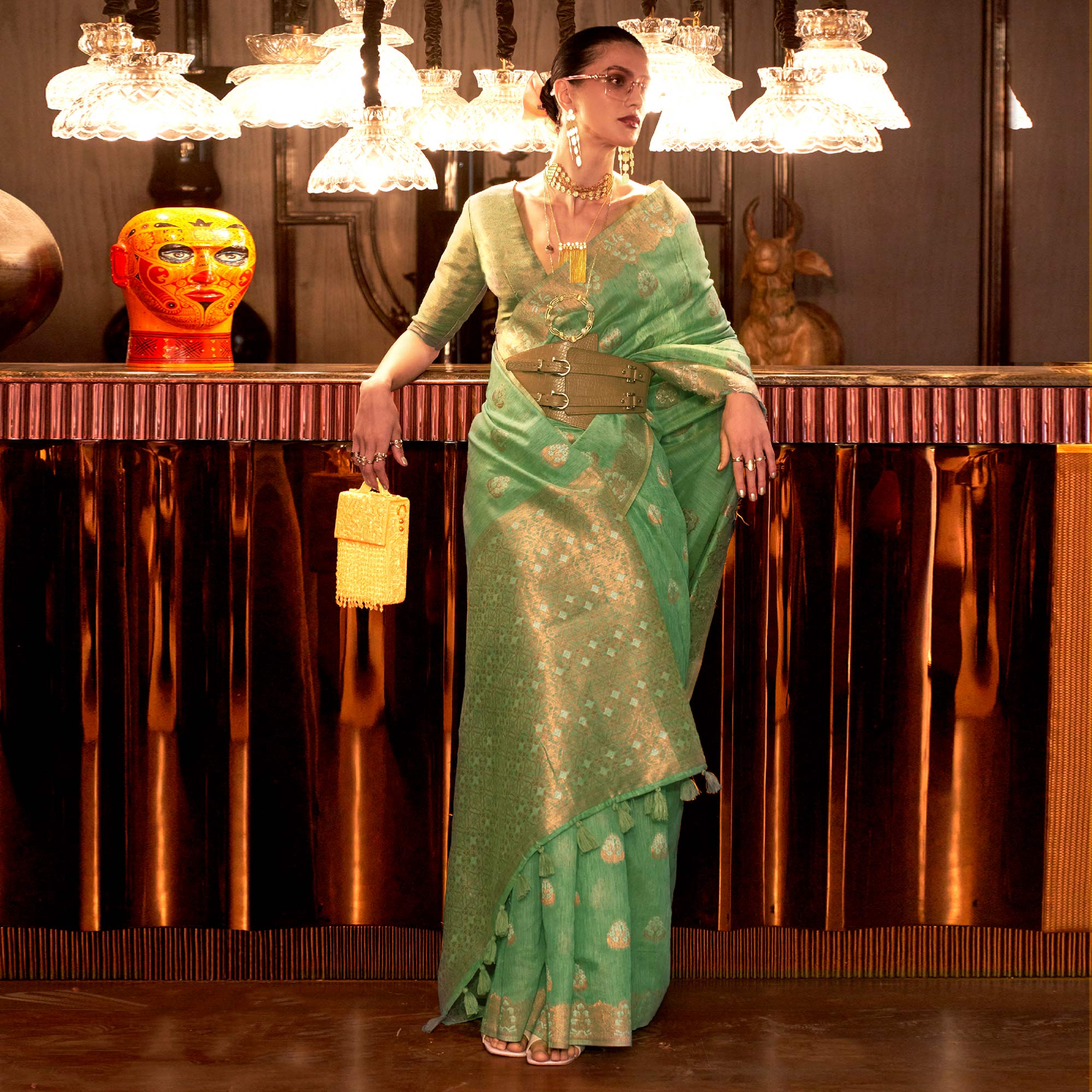 Pista Green Woven Linen Saree With Tassels