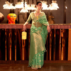 Pista Green Woven Linen Saree With Tassels