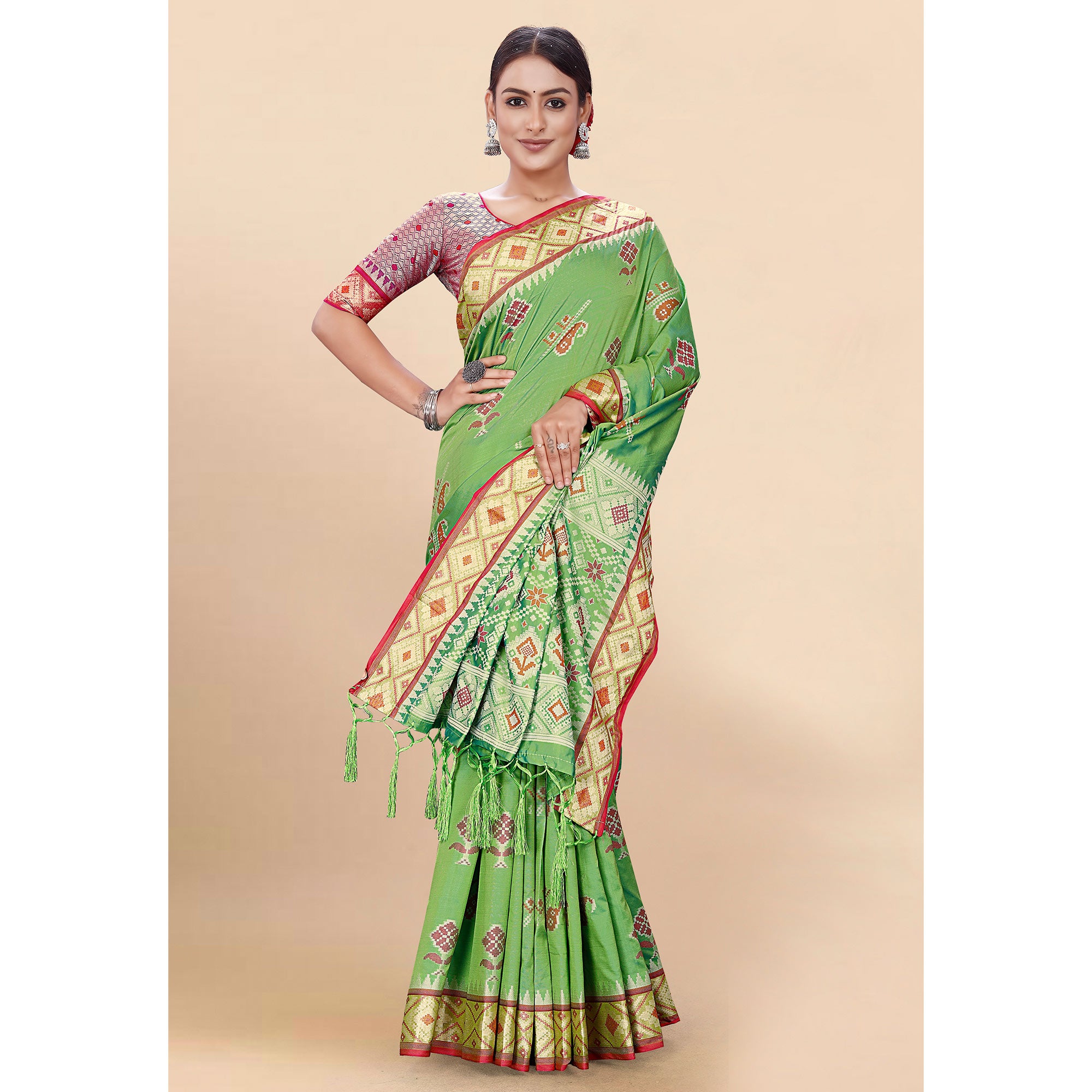 Green Woven Patola Art Silk Saree With Tassels