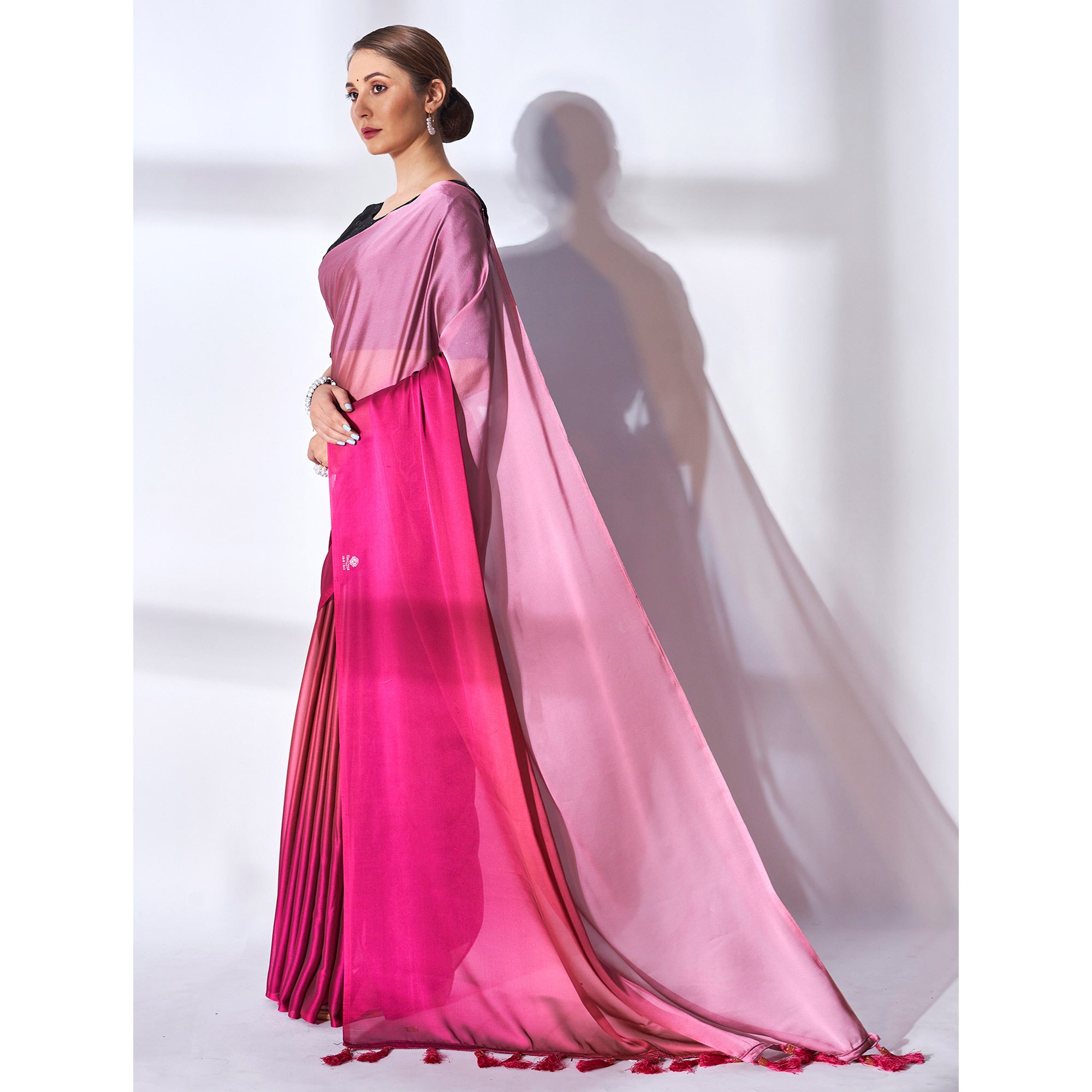Pink Solid Georgette Saree With Tassels