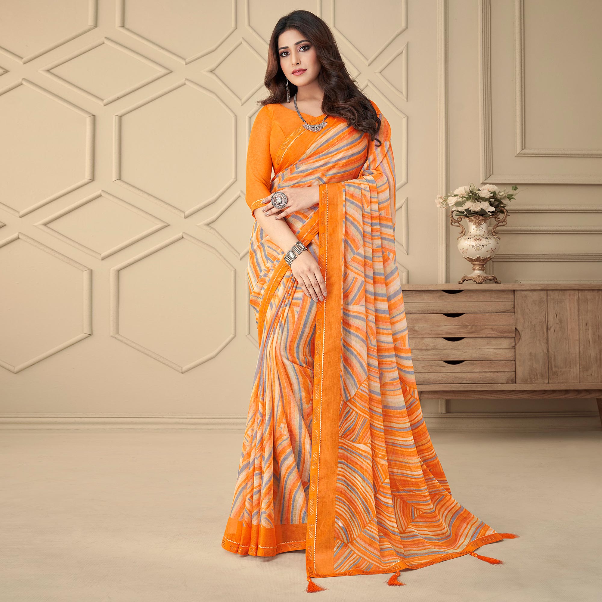Orange Printed Chiffon Saree With Tassels