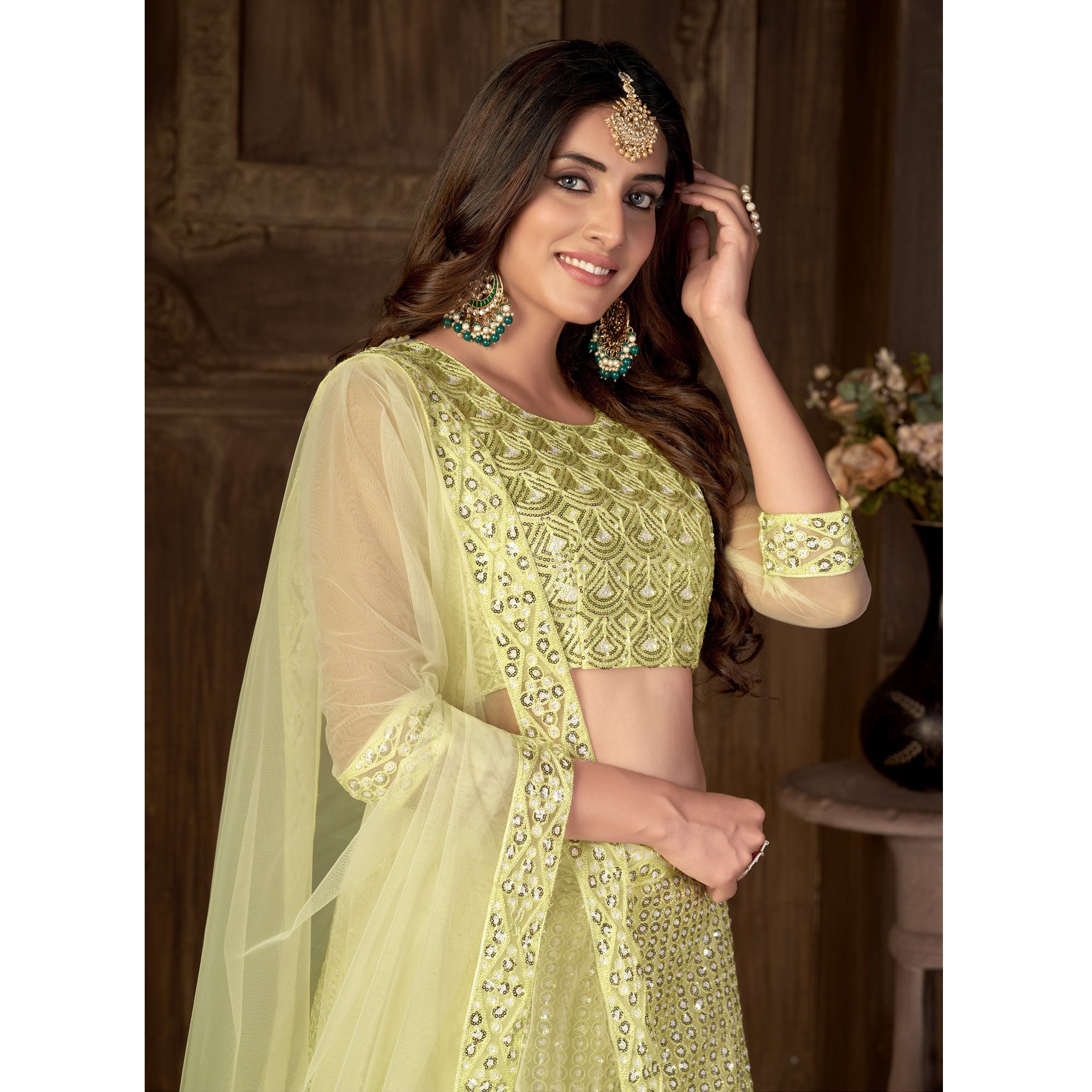 Lemon Yellow Sequins Embroidered Netted Lehenga Choli
