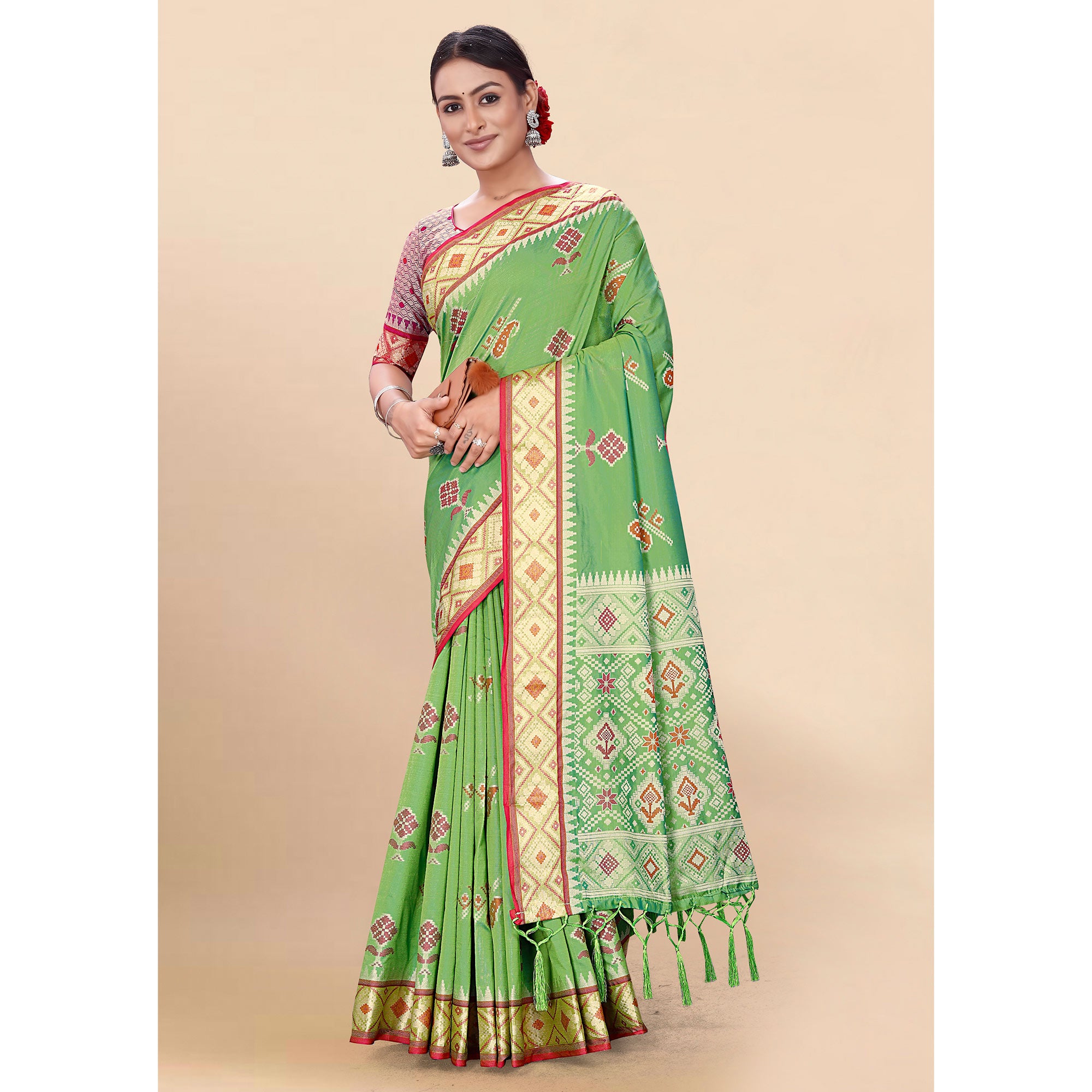 Green Woven Patola Art Silk Saree With Tassels