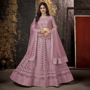 Mauve Heavy Embroidered Netted Lehenga Choli