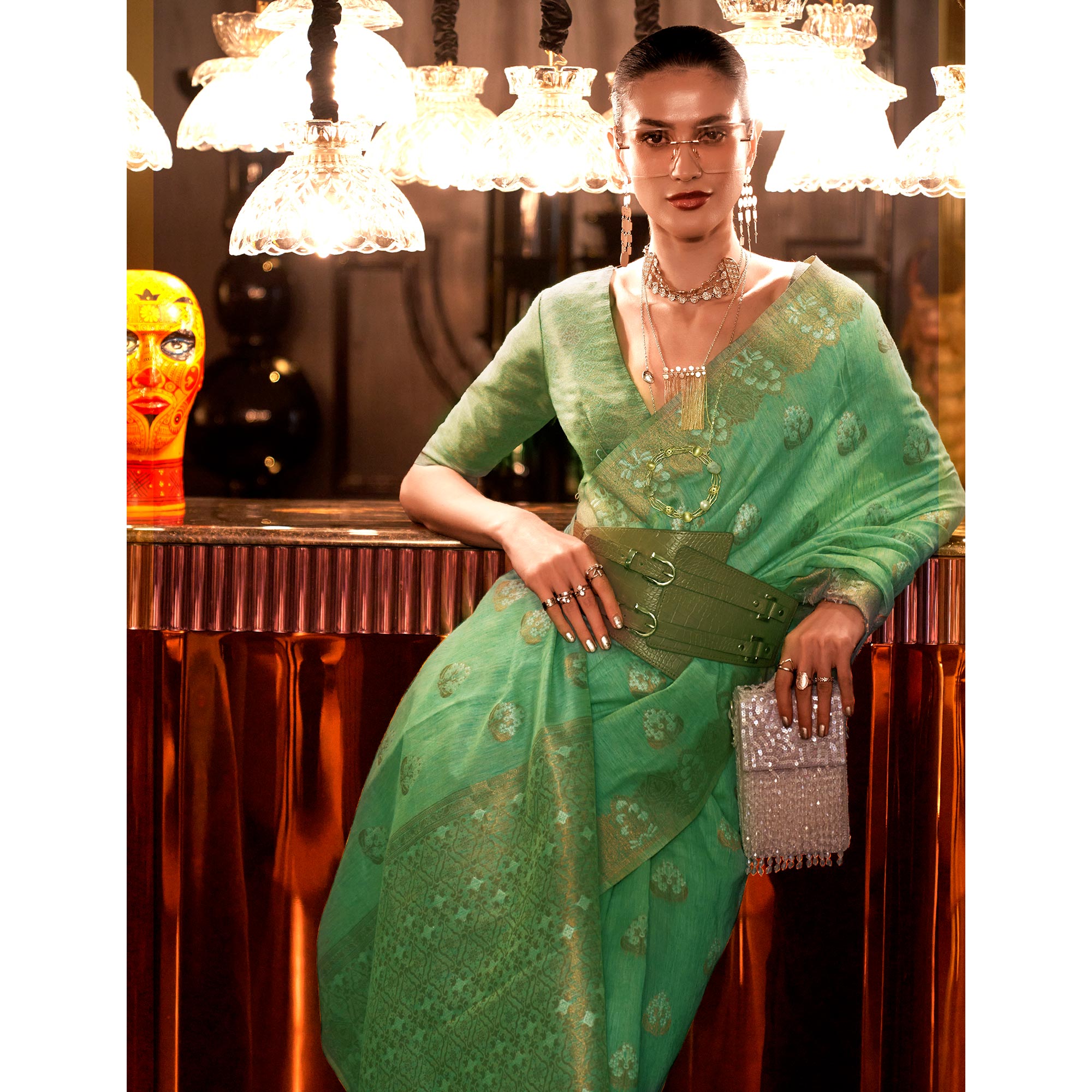 Pista Green Woven Linen Saree With Tassels