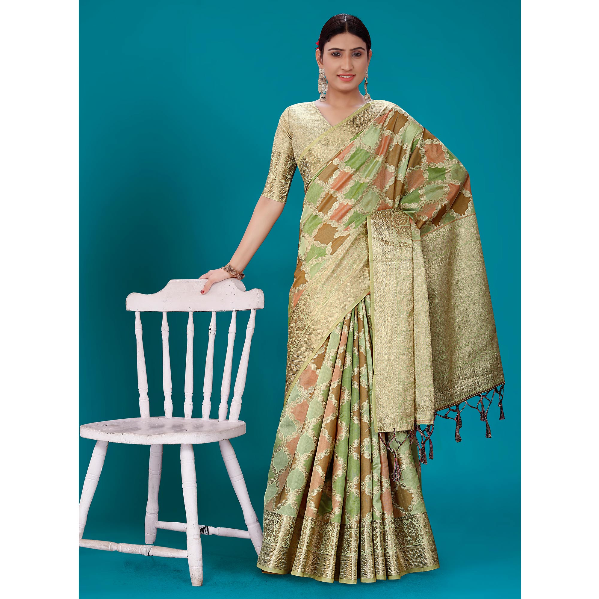 Green Woven Organza Saree With Tassels