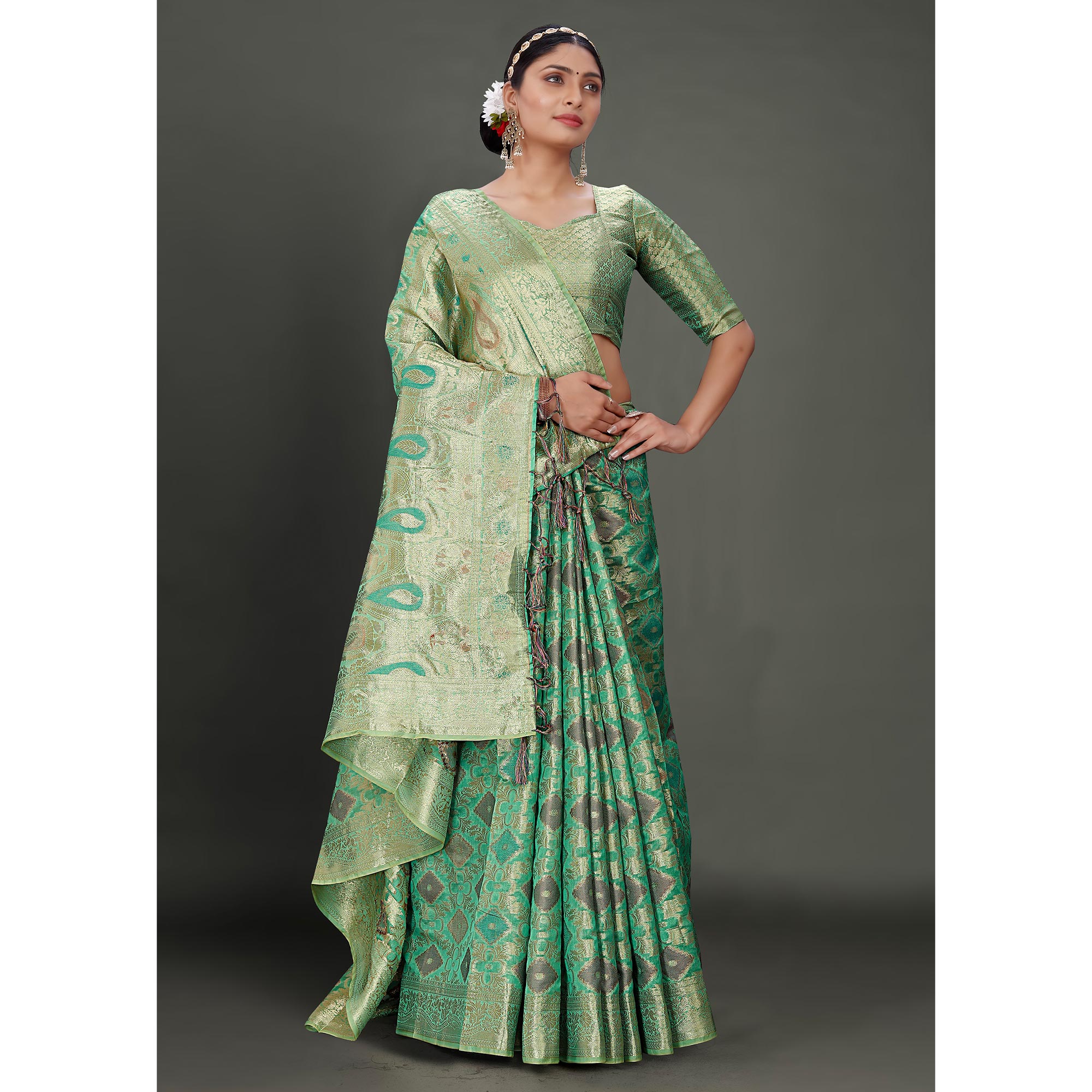 Rama Green Woven Organza Saree With Tassels