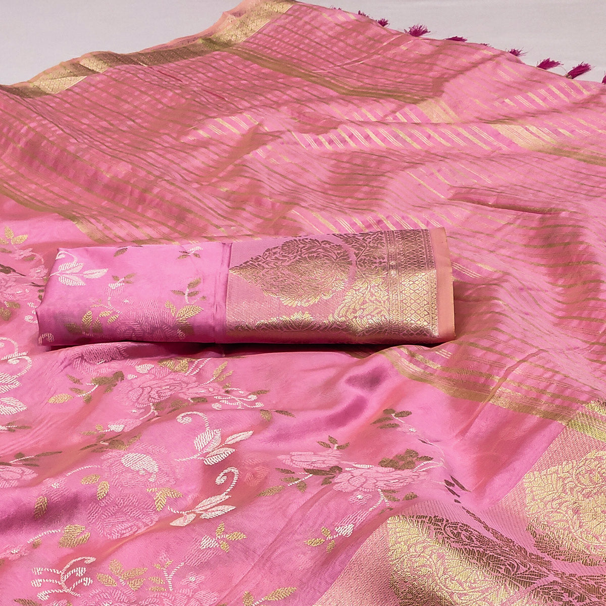 Pink Woven Organza Saree With Tassels