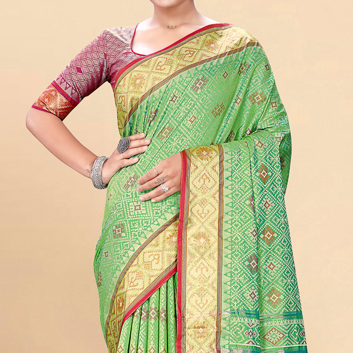 Green Woven Patola Art Silk Saree With Tassels
