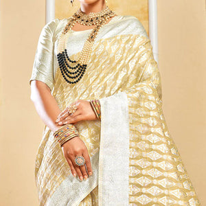 Beige Woven Cotton Silk Saree With Tassels