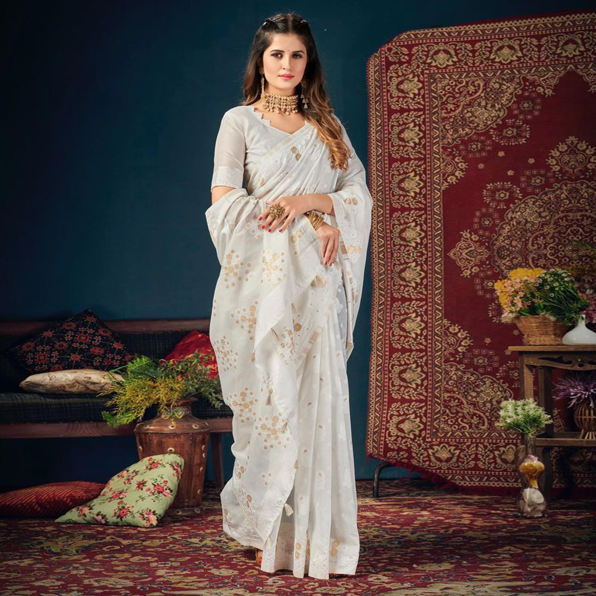 White Woven Cotton Blend Saree With Tassels