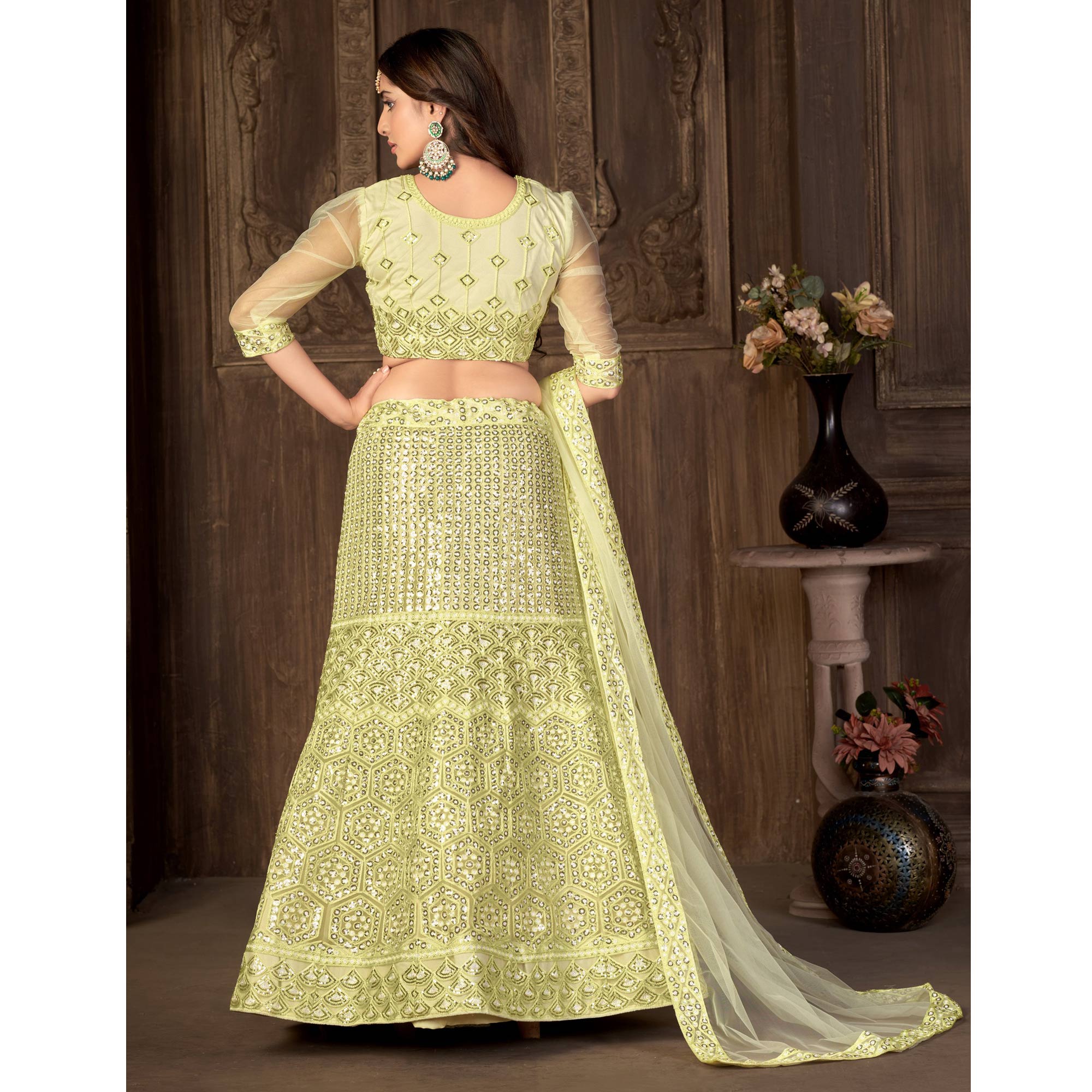 Lemon Yellow Sequins Embroidered Netted Lehenga Choli